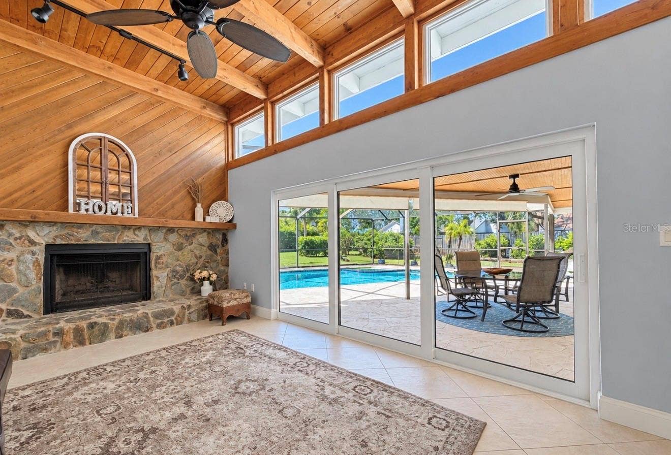 9690 LEEWARD AVENUE, Largo, FL 33773 Family room with fireplace