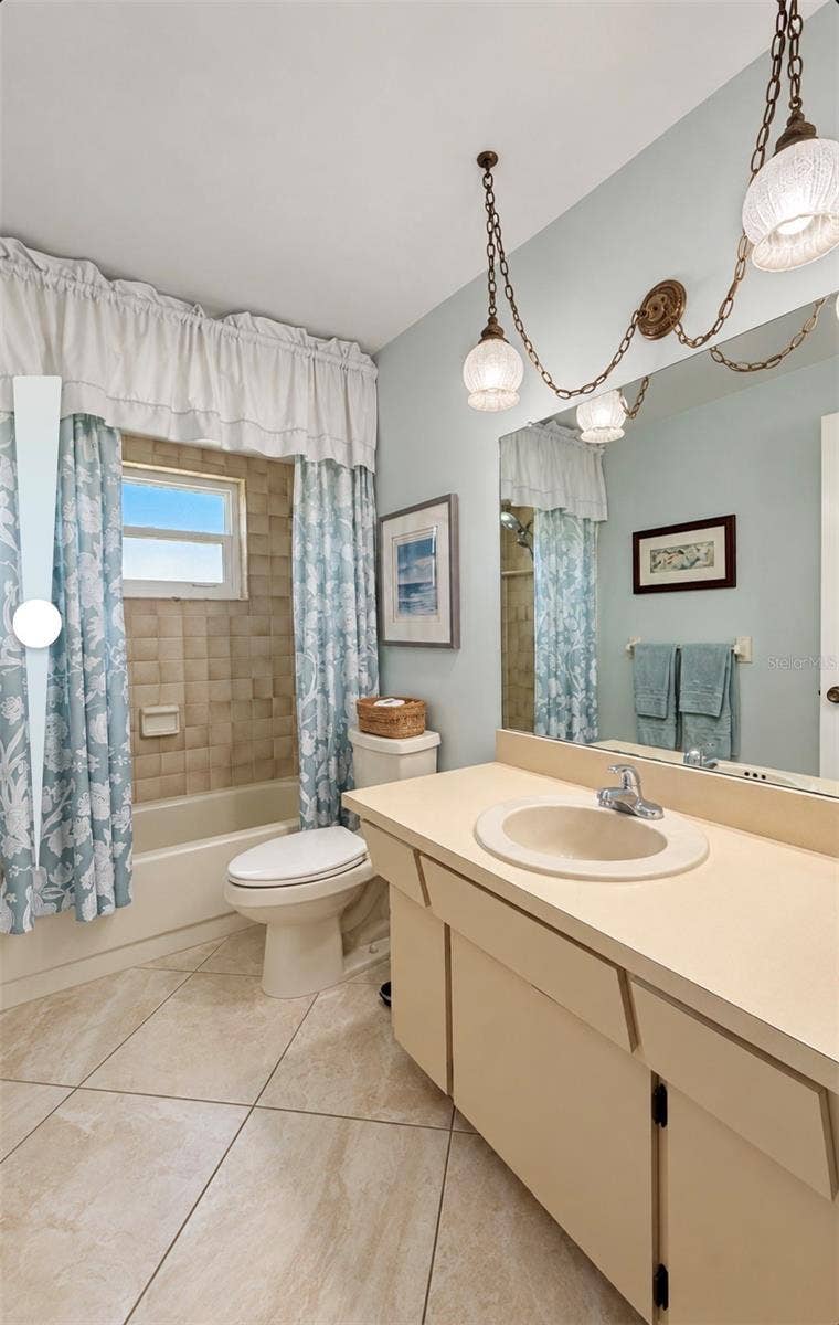 9690 LEEWARD AVENUE, Largo, FL 33773 Hallway bathroom