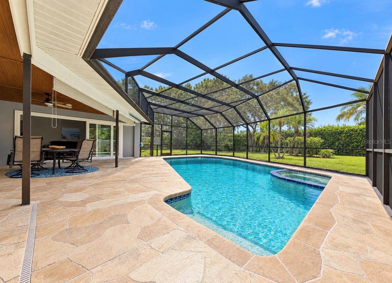9690 LEEWARD AVENUE, Largo, FL 33773 Screened Enclosed pool area