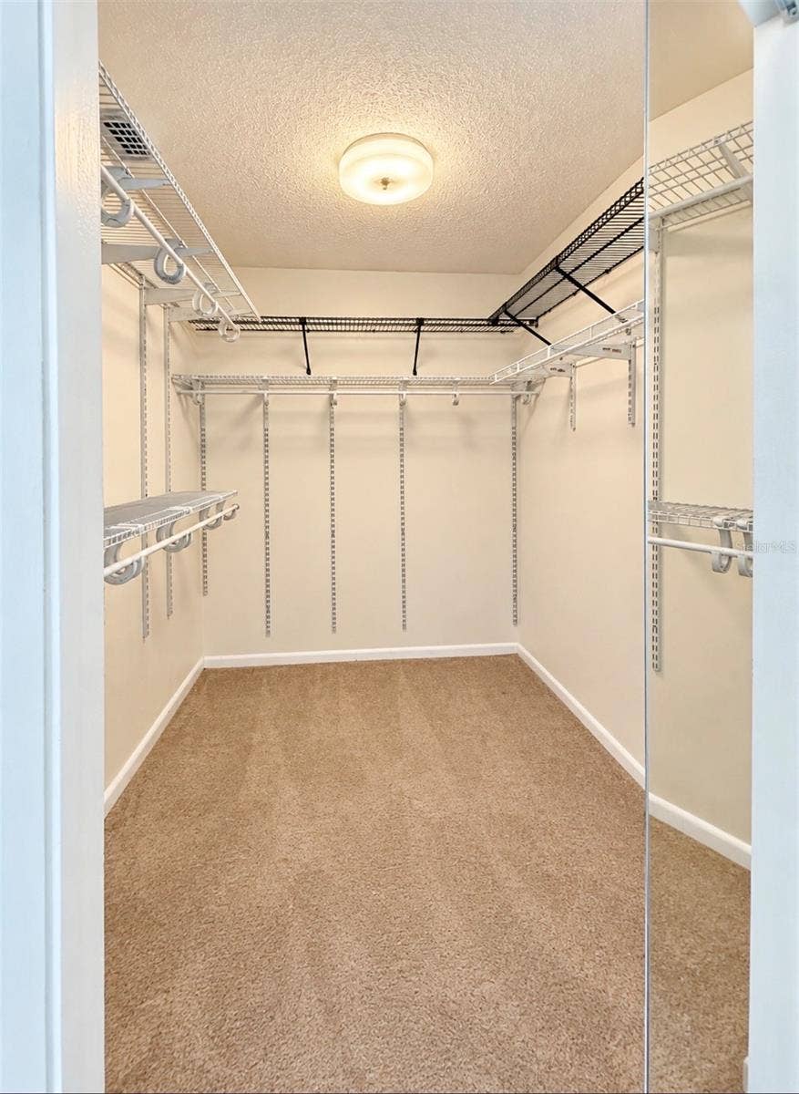 9690 LEEWARD AVENUE, Largo, FL 33773 Primary walk-in closet