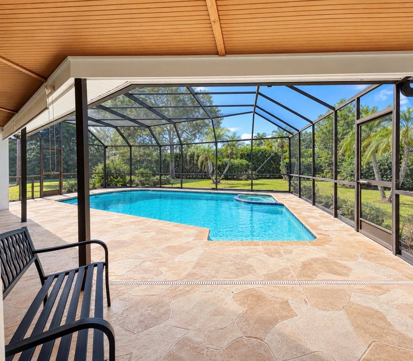 9690 LEEWARD AVENUE, Largo, FL 33773 Pool covered lanai or primary bedroom