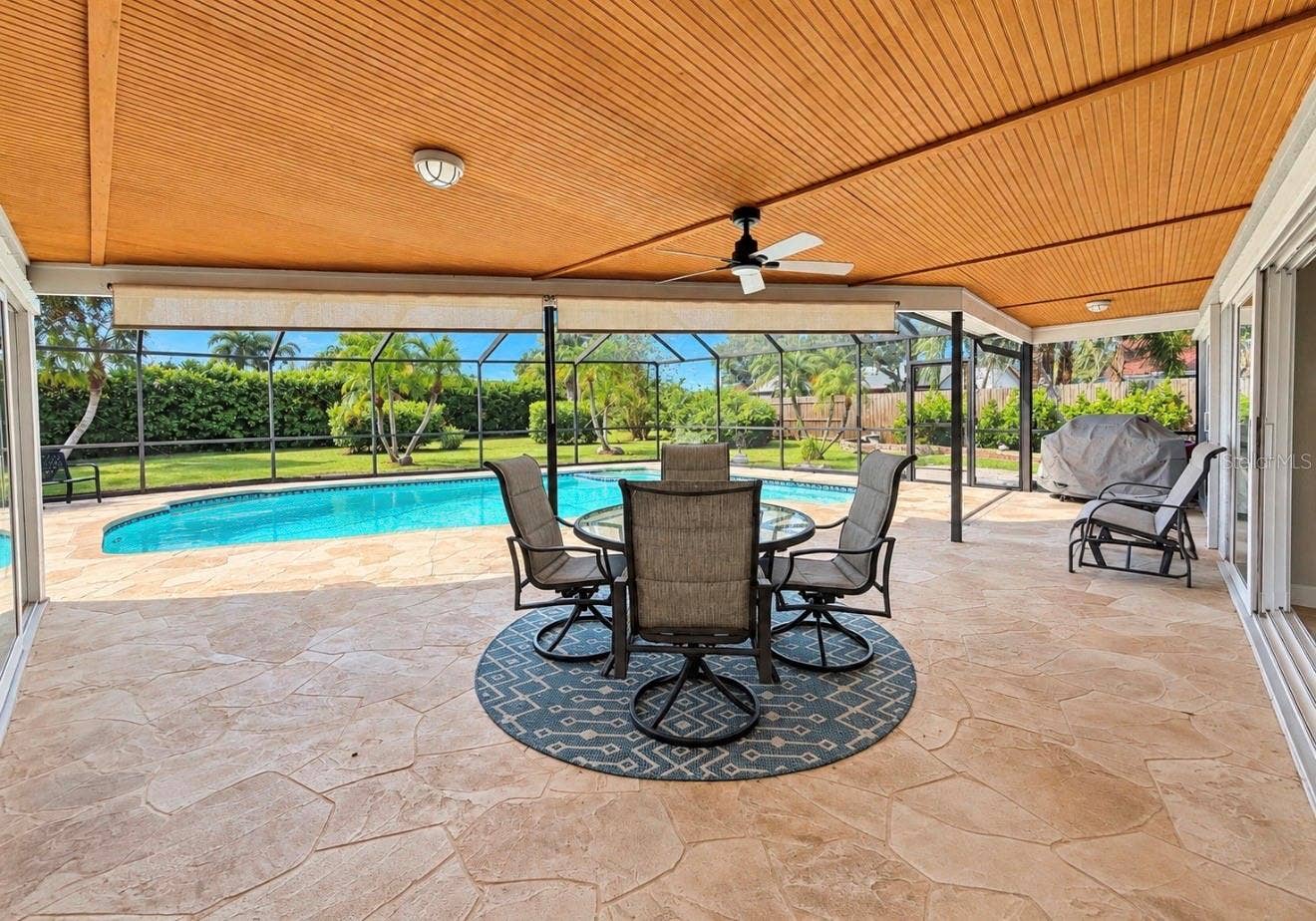 9690 LEEWARD AVENUE, Largo, FL 33773 Pool covered lanai off living room