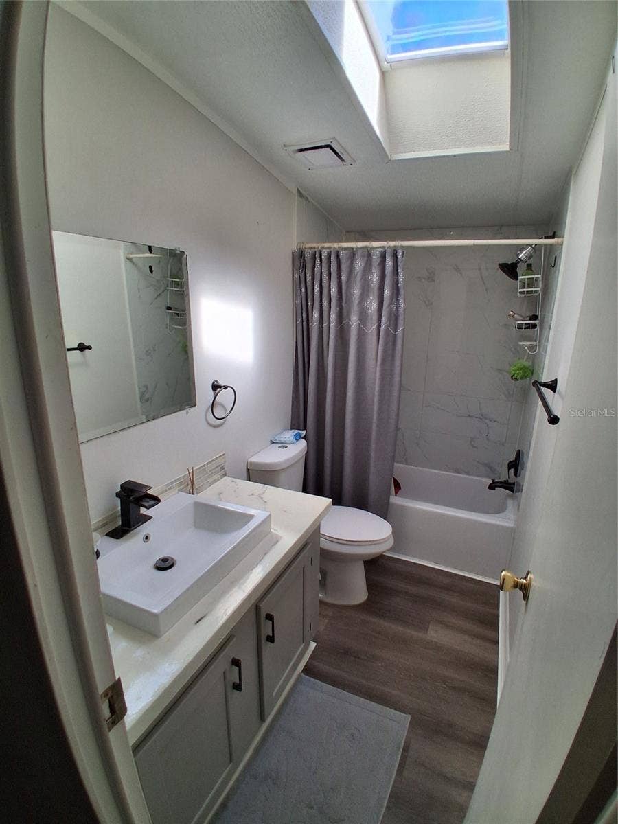 37650 NEWPORT DRIVE, Zephyrhills, FL 33542 Notice the recently updated guest bathroom.