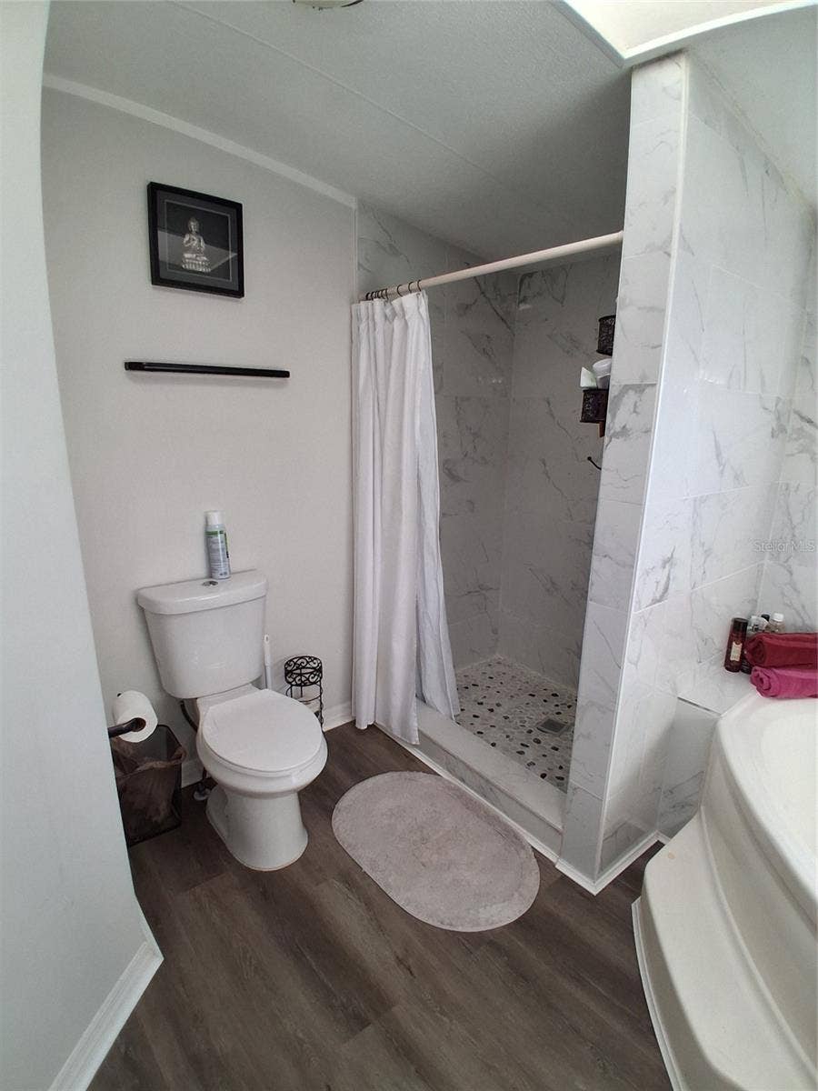 37650 NEWPORT DRIVE, Zephyrhills, FL 33542 Primary bath also has a walk-in shower for great convenience for everyone.