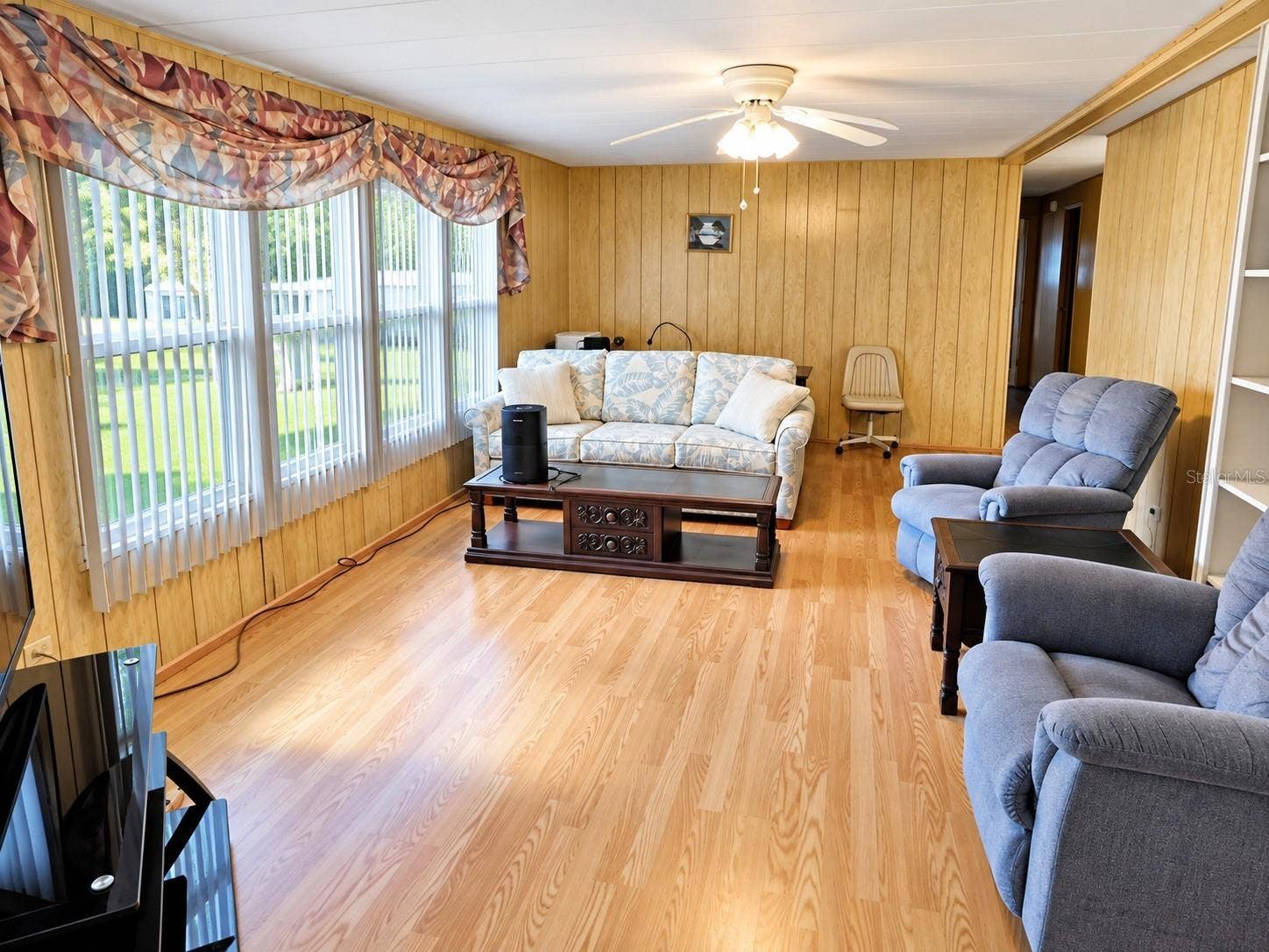 4611 OLIVE DRIVE, Zephyrhills, FL 33542 Laminate flooring and double pane windows.