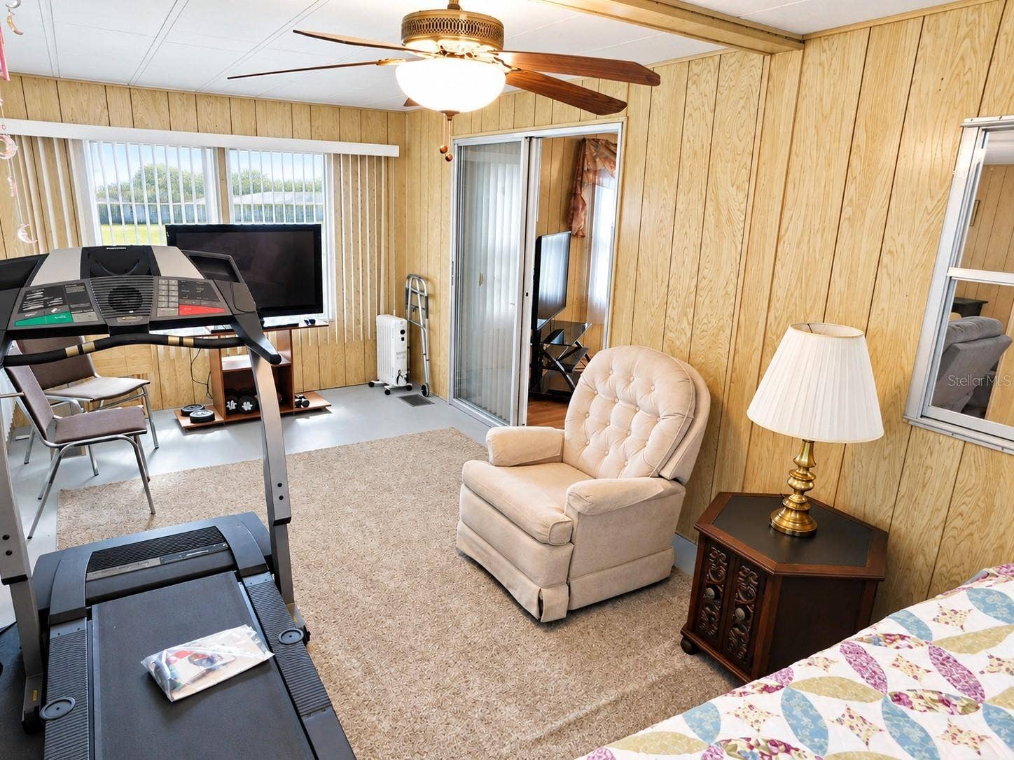 4611 OLIVE DRIVE, Zephyrhills, FL 33542 Many ceiling fans.