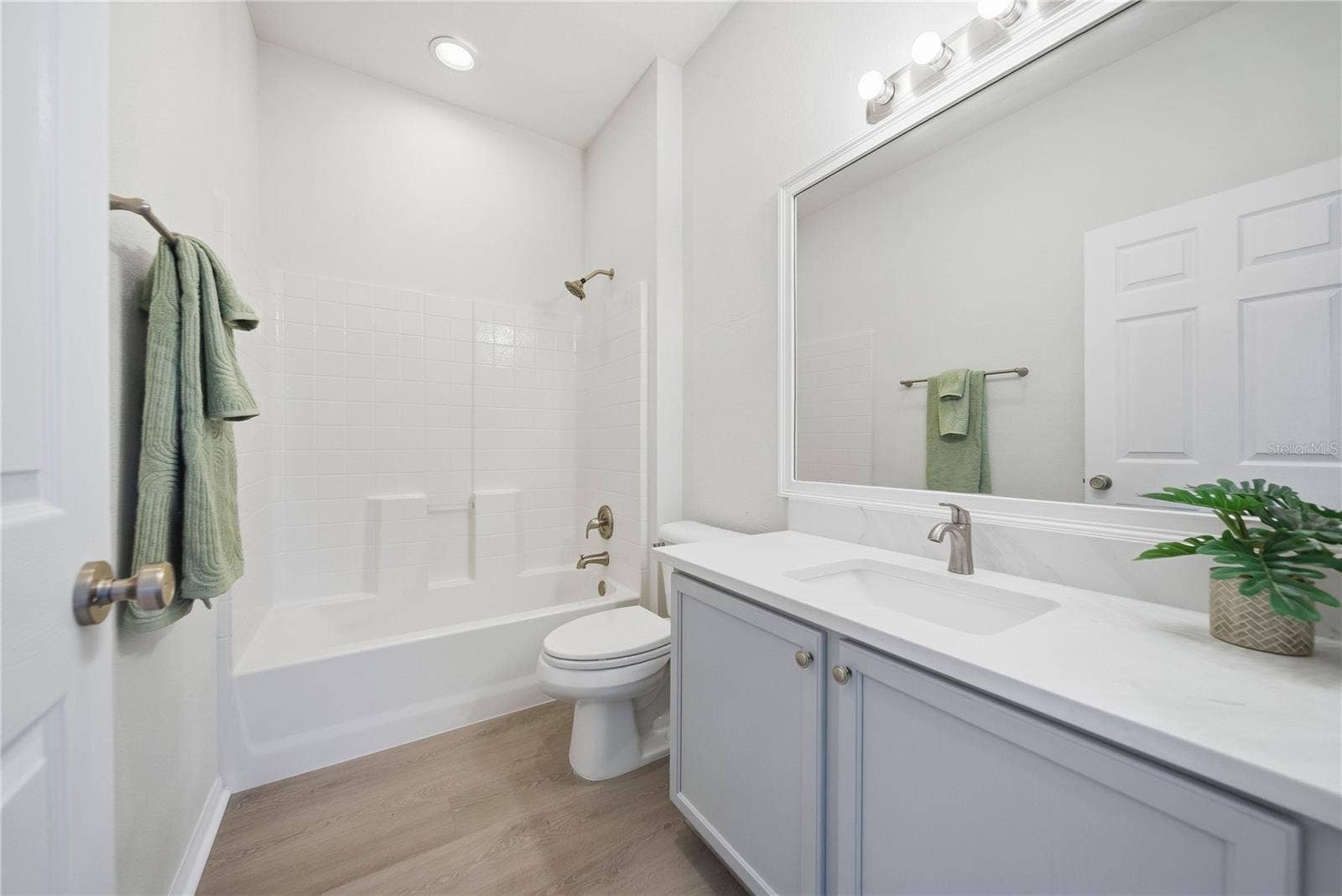 Beautifully updated with new paint, new flooring and a quartz counter top!