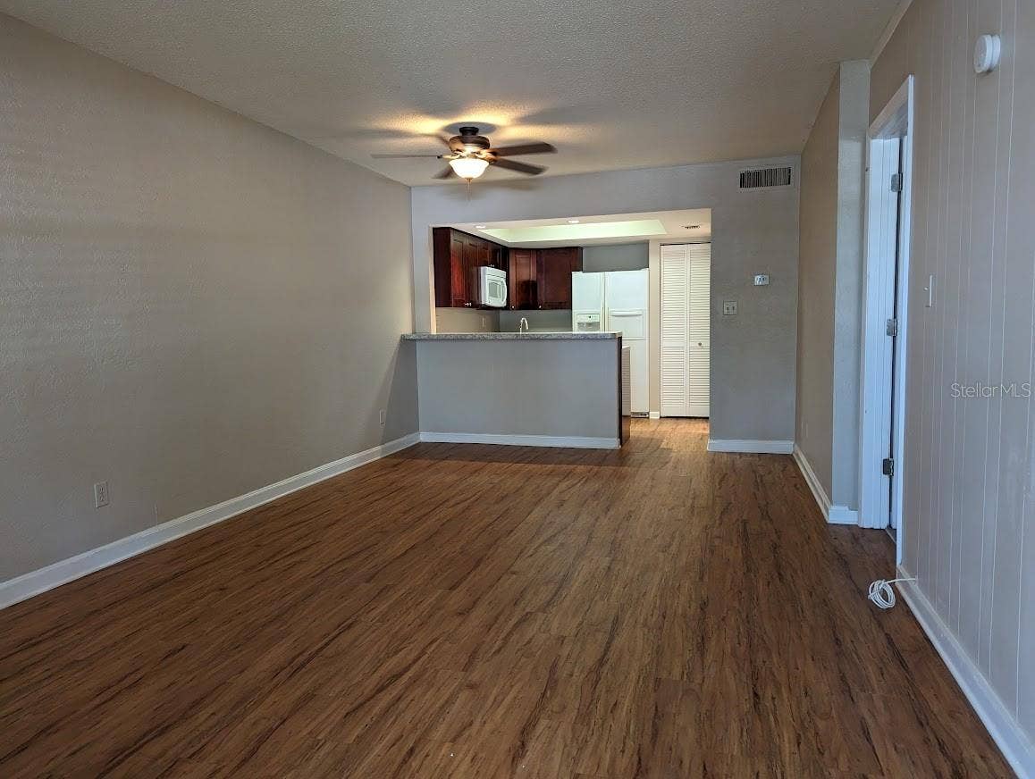View from entry of living room & kitchen