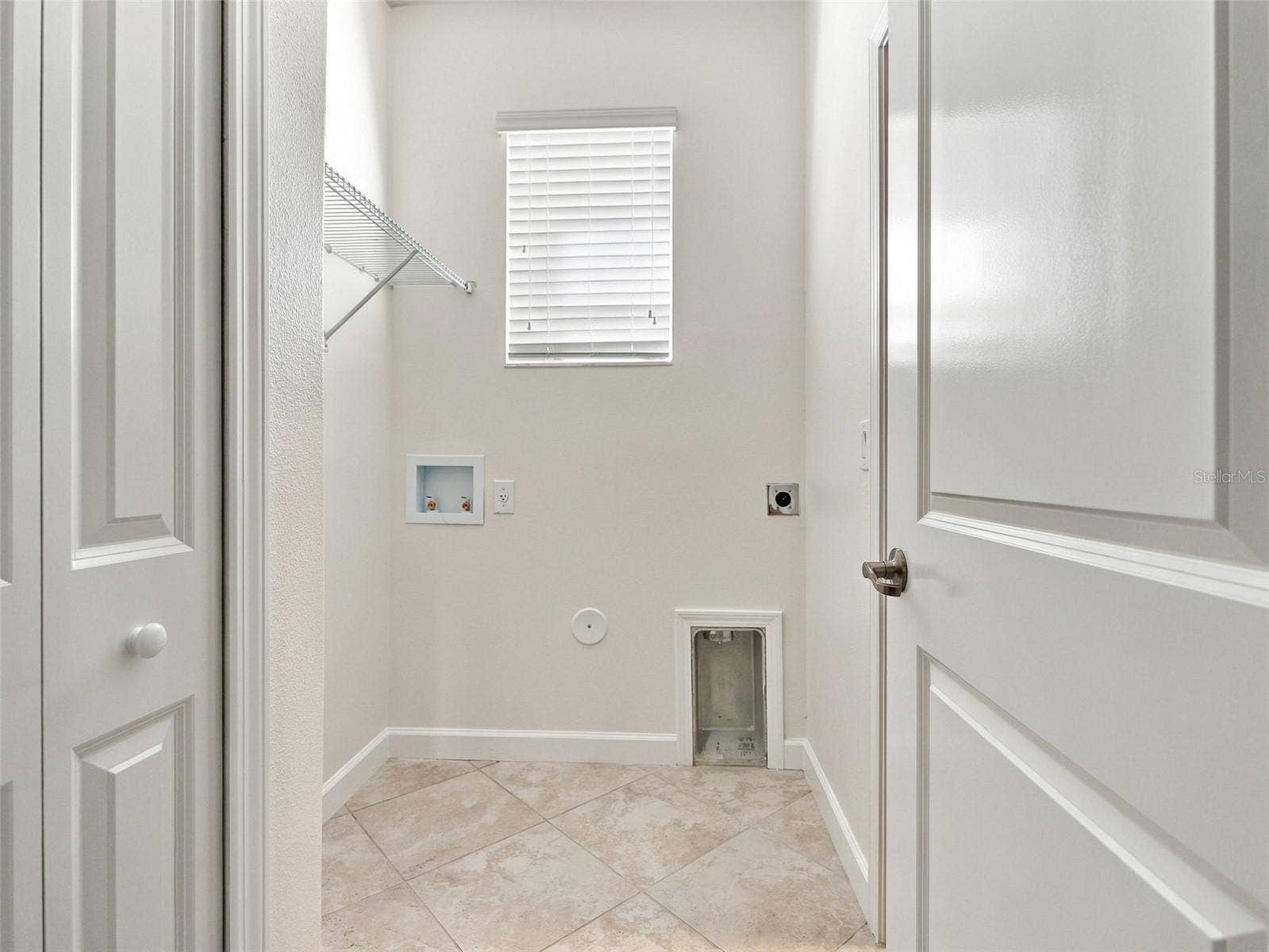 1573 TALLULAH TERRACE, Wesley Chapel, FL 33543 Laundry Room