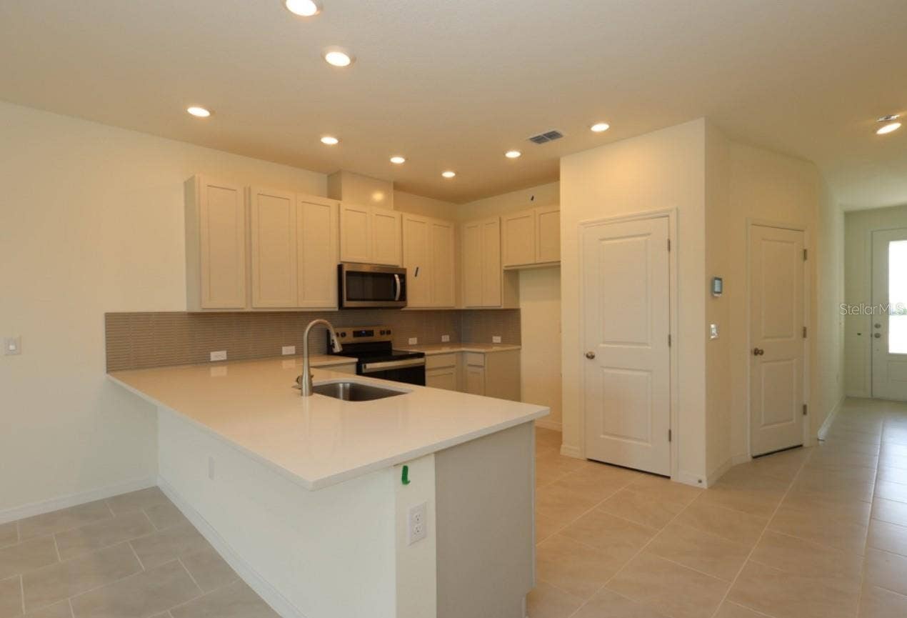 6426 JENSEN VIEW AVENUE, Apollo Beach, FL 33572 Kitchen **Under Construction