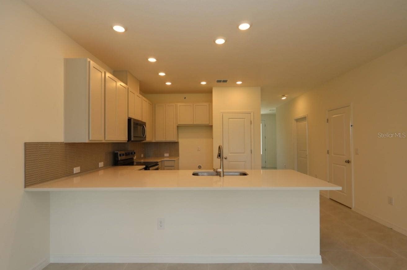 6426 JENSEN VIEW AVENUE, Apollo Beach, FL 33572 Kitchen **Under Construction