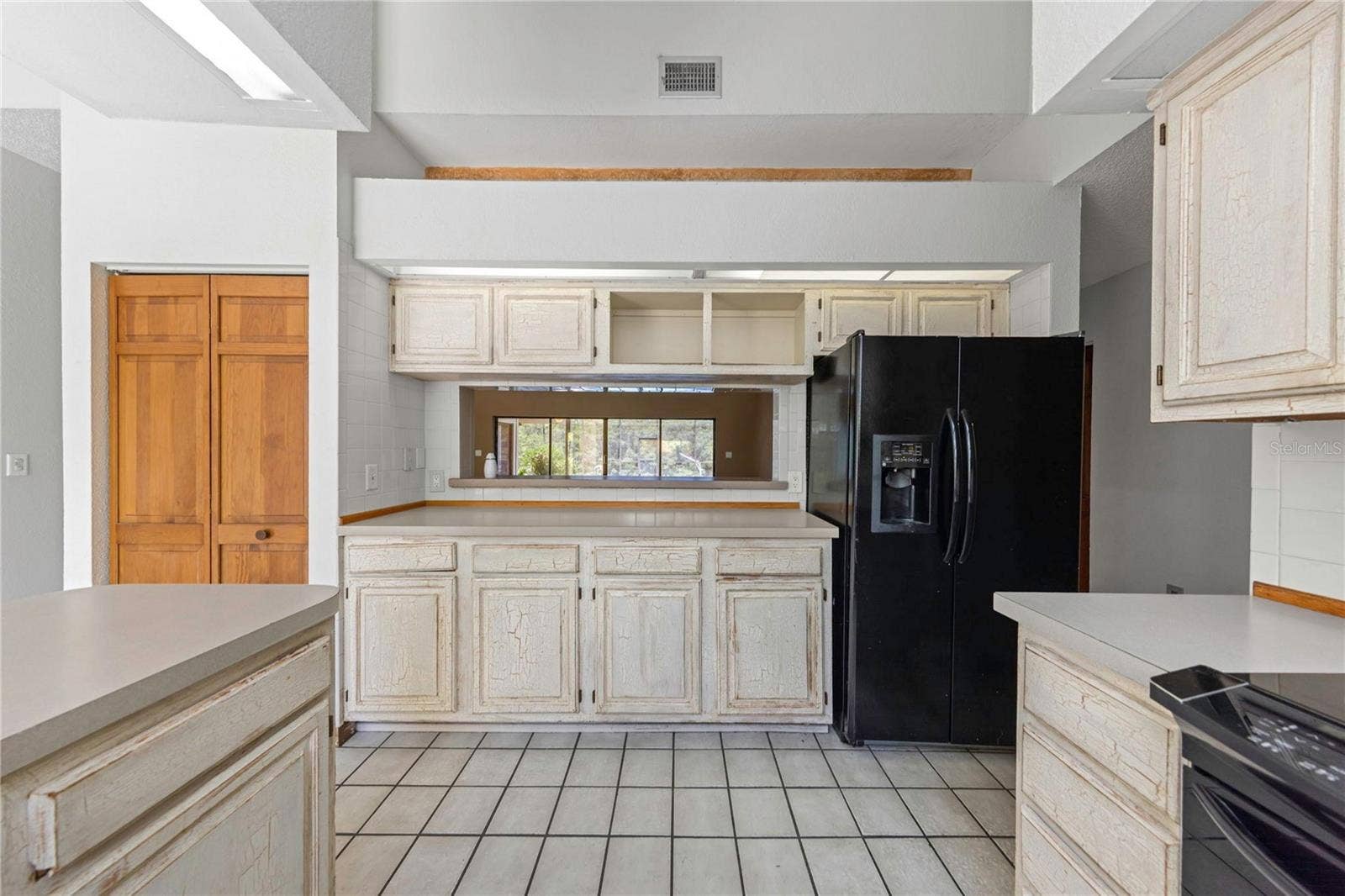 7448 17TH LANE NE, St Petersburg, FL 33702 Kitchen - Reverse View