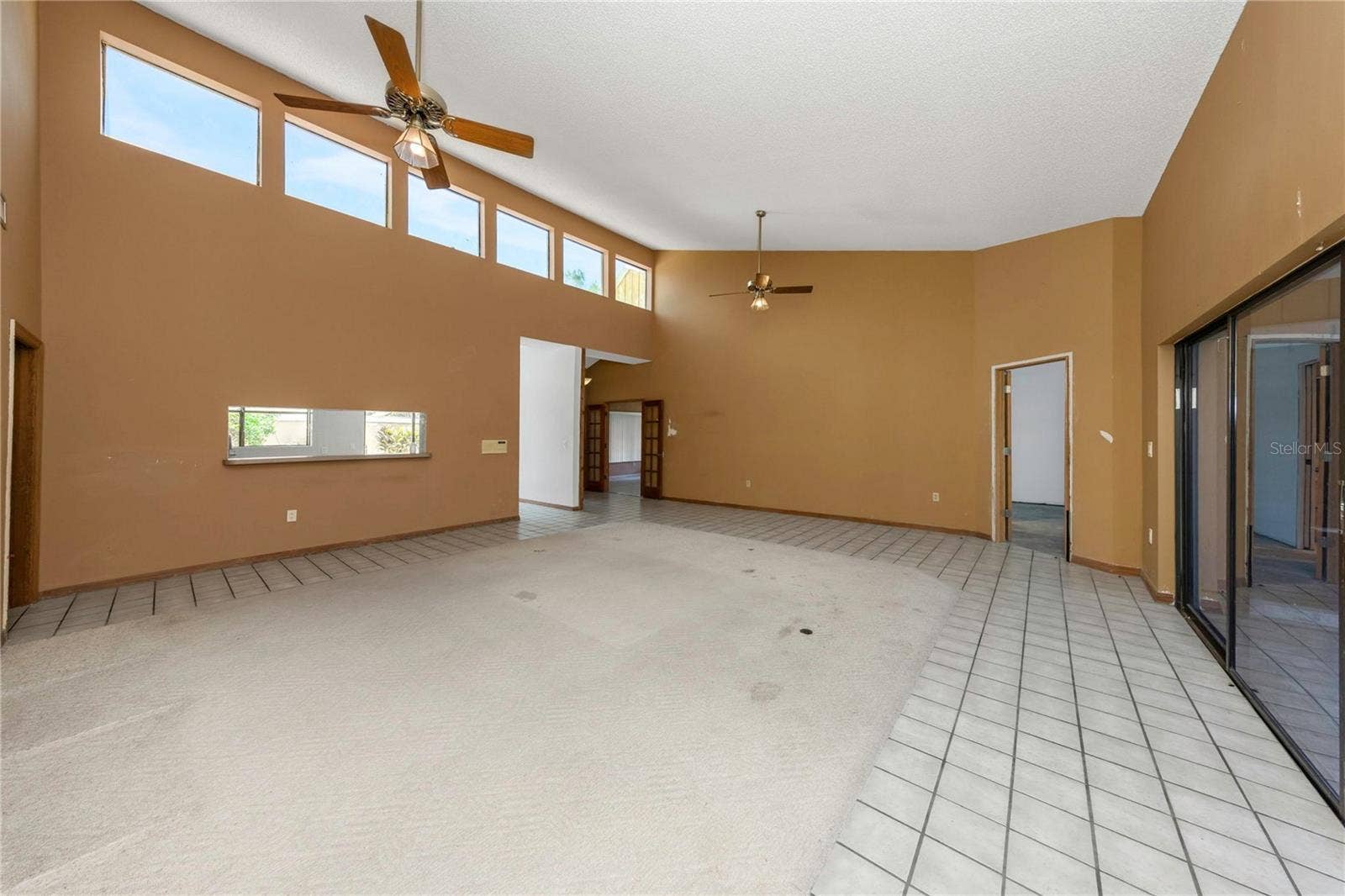 7448 17TH LANE NE, St Petersburg, FL 33702 Living Room - Reverse View