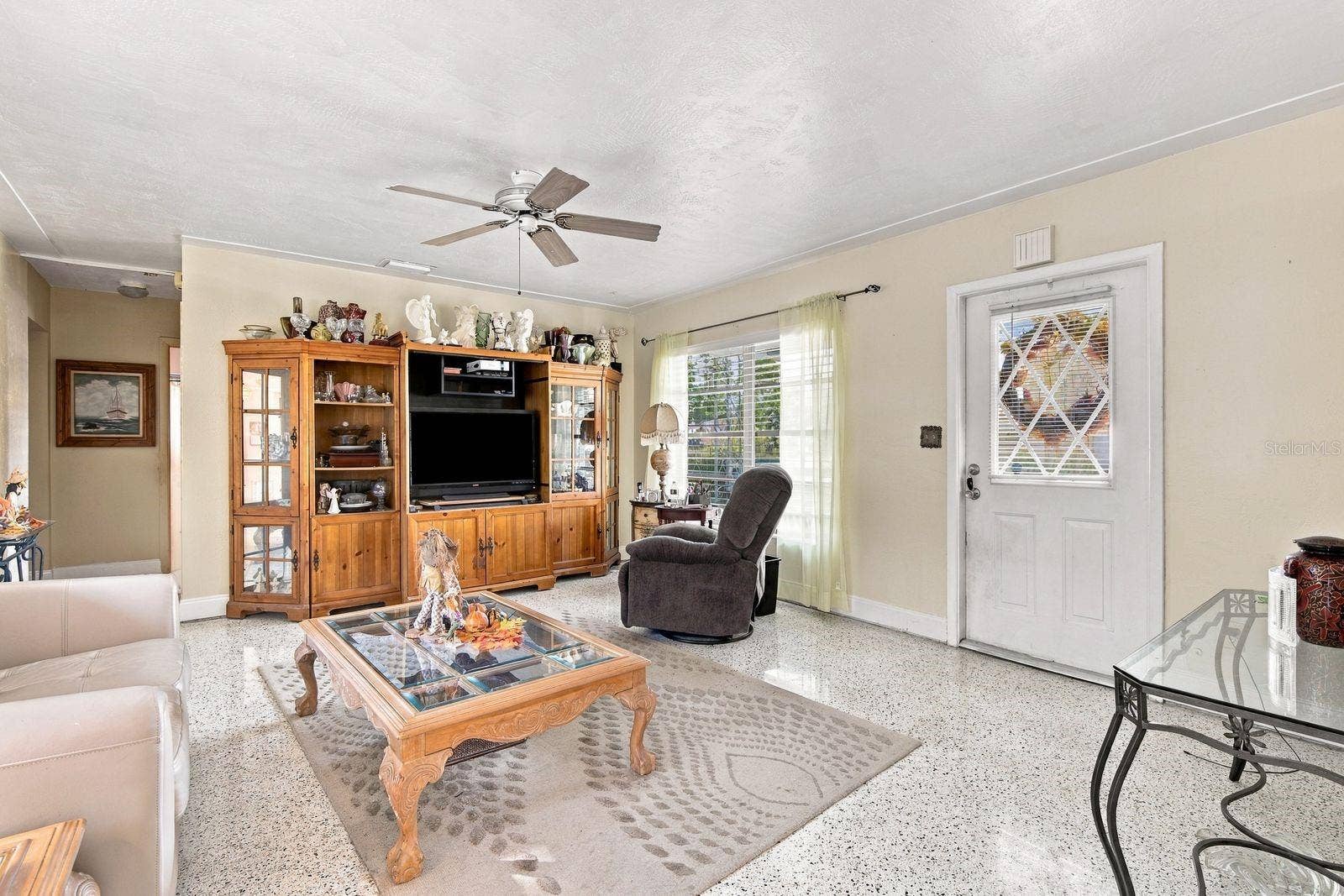 6801 17TH LANE N, St Petersburg, FL 33702 Family room wth gorgeous terrazzo flooring