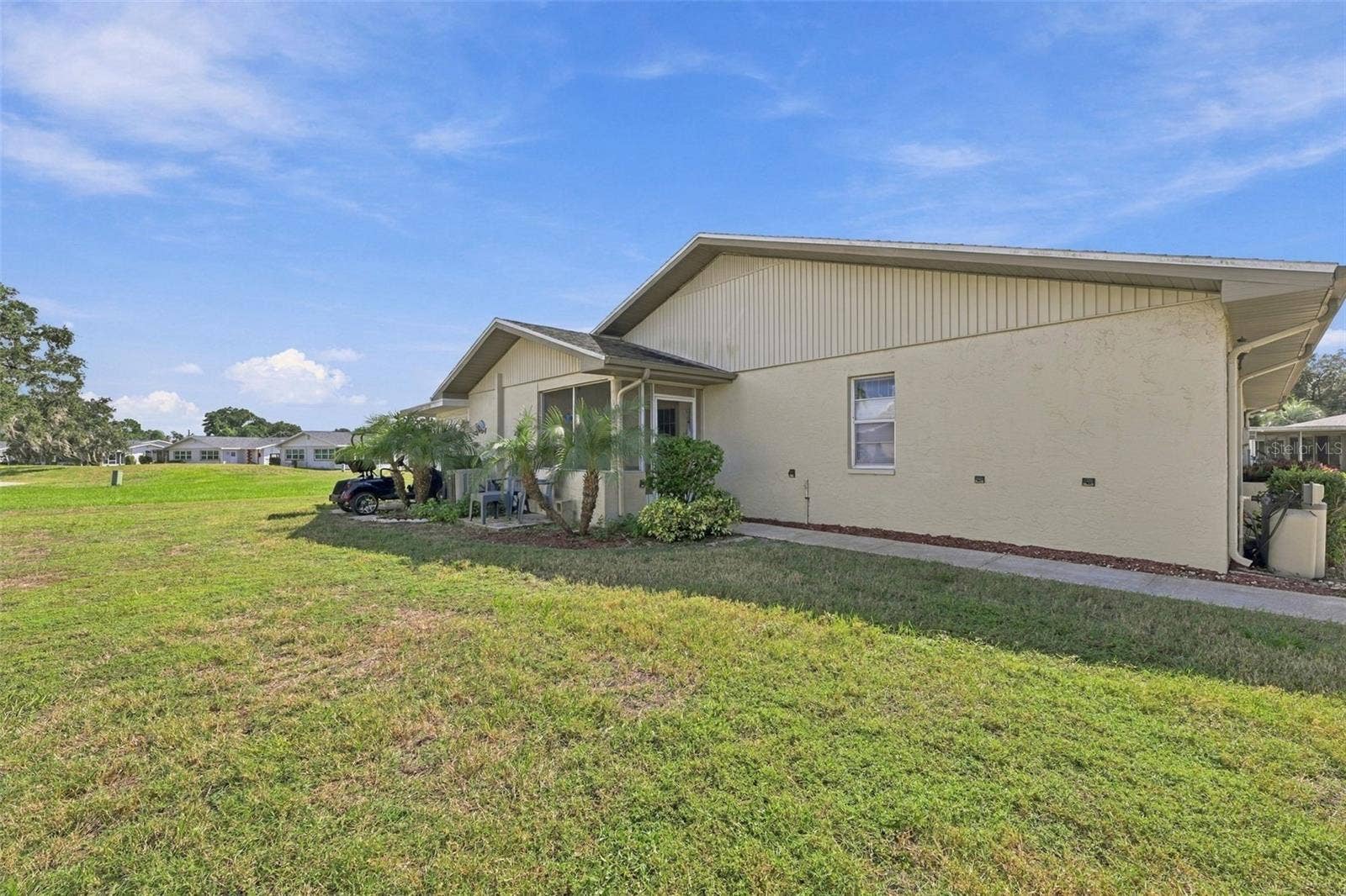 1905 CANTERBURY LANE, #8, Sun City Center, FL 33573 Side of the home