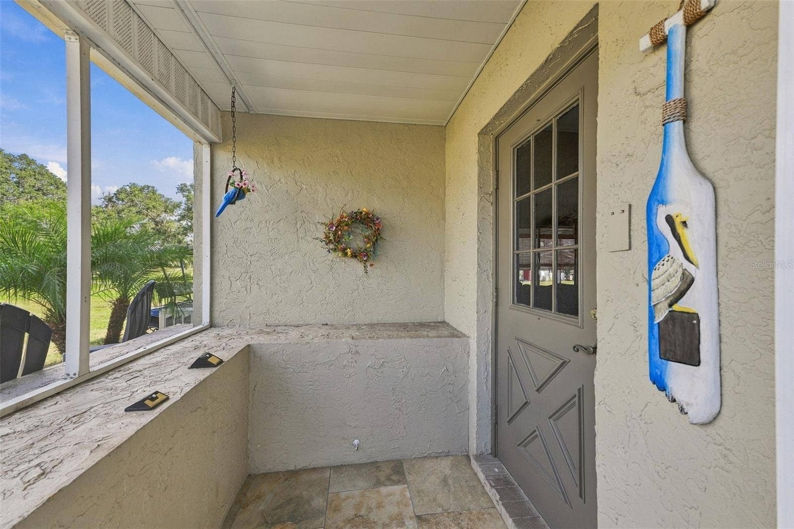 1905 CANTERBURY LANE, #8, Sun City Center, FL 33573 Screened in Front entrance
