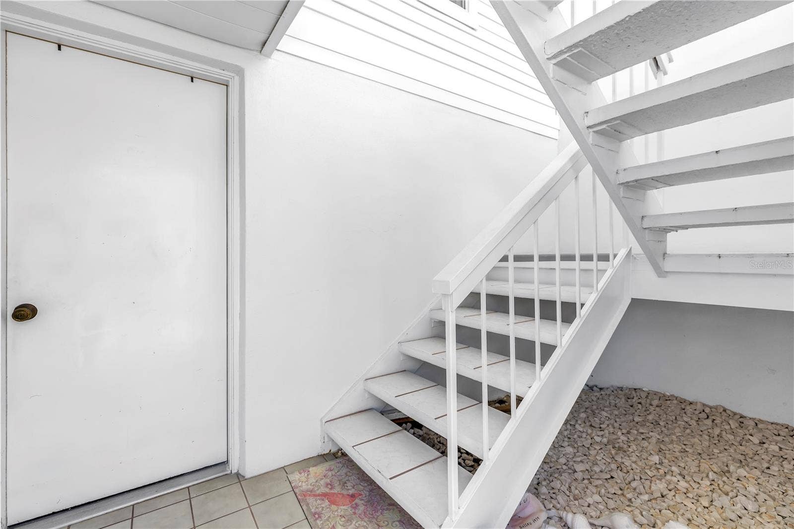 159 SUN ISLE CIR, Treasure Island, FL 33706 Door to 3+ Garage and storage