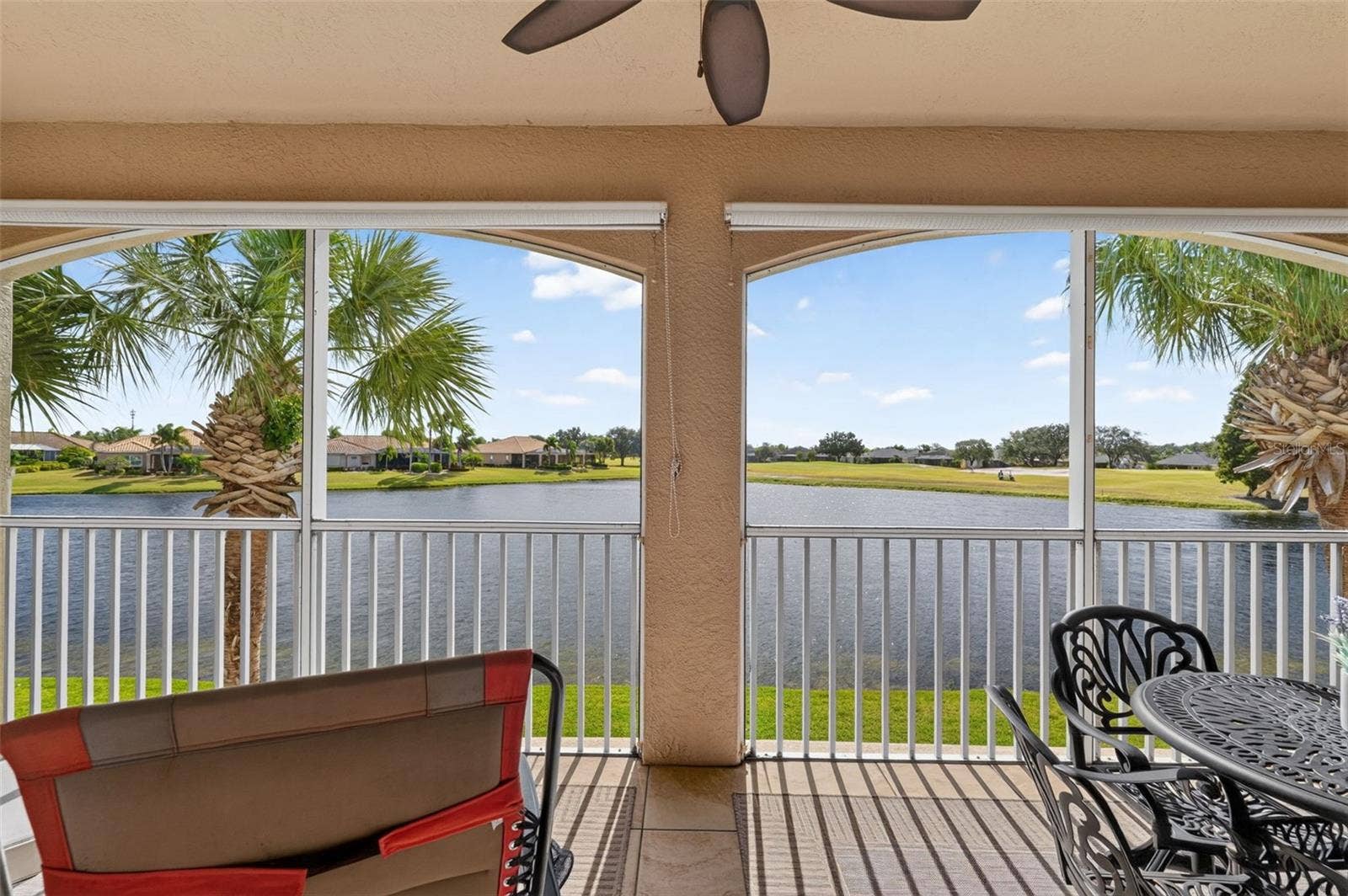 1360 EMERALD DUNES DRIVE, Sun City Center, FL 33573 Screened balcony with water view