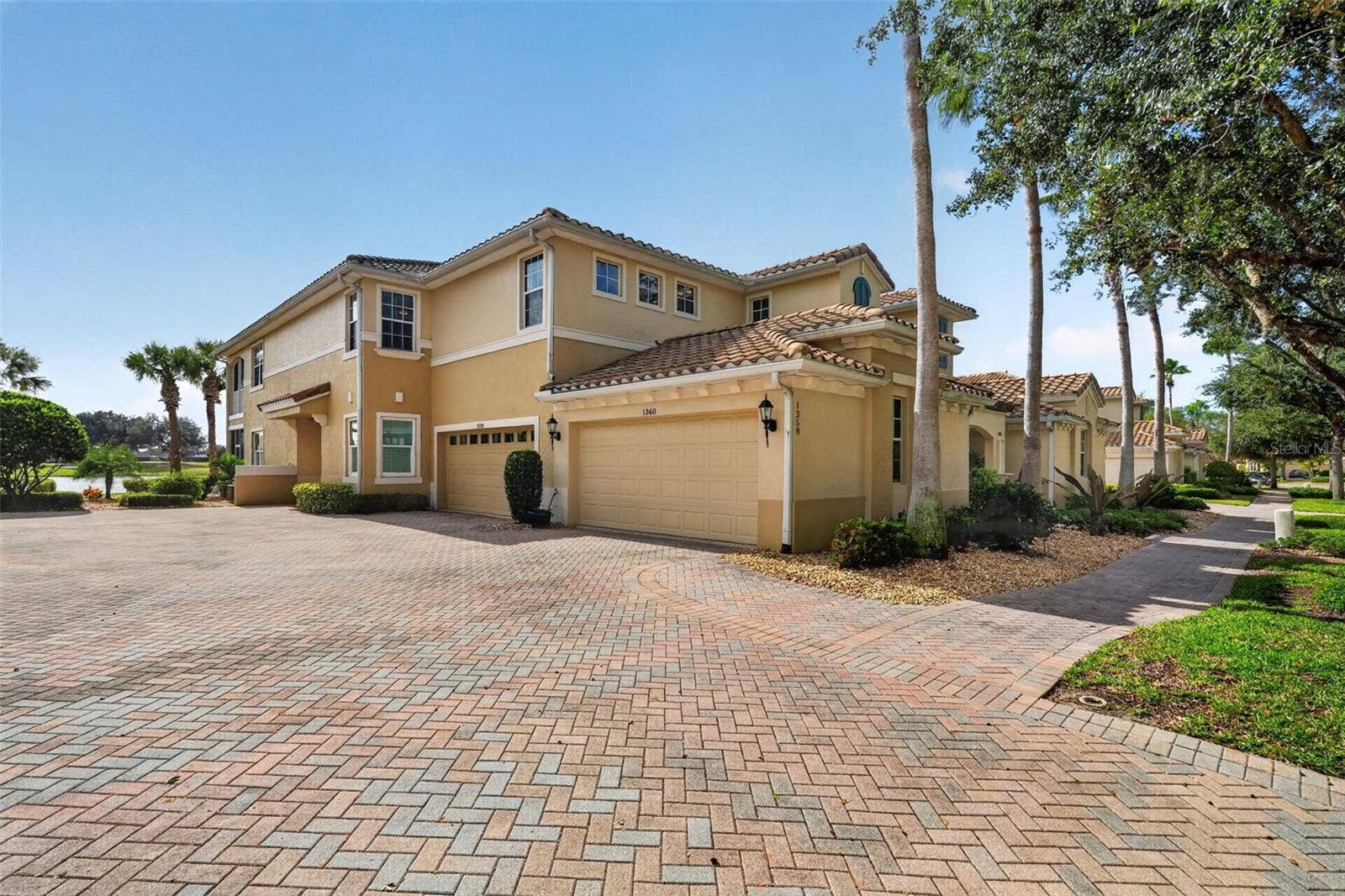 1360 EMERALD DUNES DRIVE, Sun City Center, FL 33573 2-car garage with spacious driveway