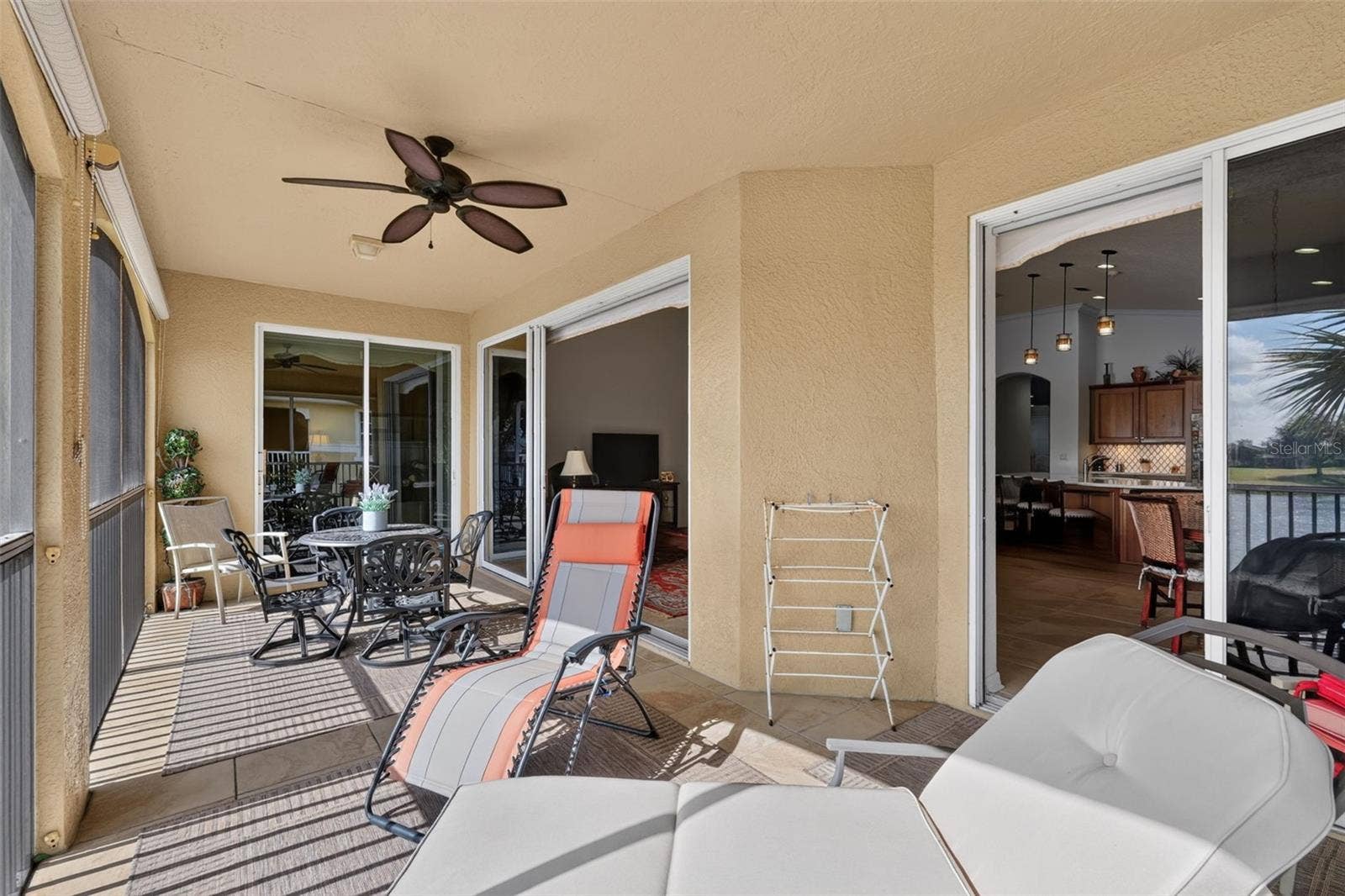 1360 EMERALD DUNES DRIVE, Sun City Center, FL 33573 Screened balcony with water view