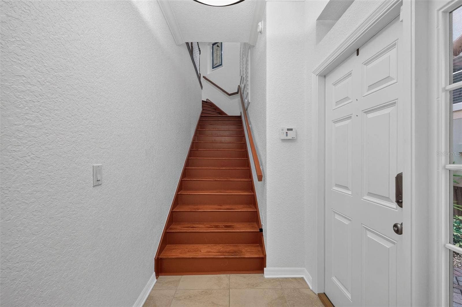 1360 EMERALD DUNES DRIVE, Sun City Center, FL 33573 Wood staircase to 2nd floor
