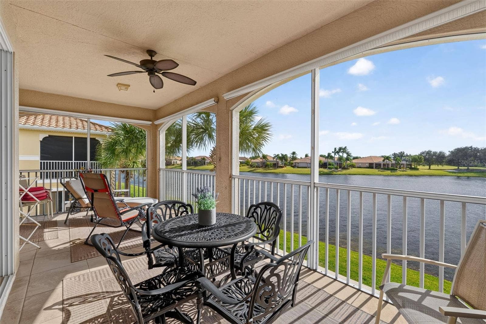 1360 EMERALD DUNES DRIVE, Sun City Center, FL 33573 Screened balcony with water view
