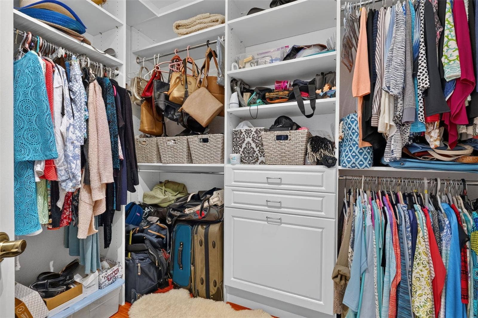 1360 EMERALD DUNES DRIVE, Sun City Center, FL 33573 Primary walk-in custom closet