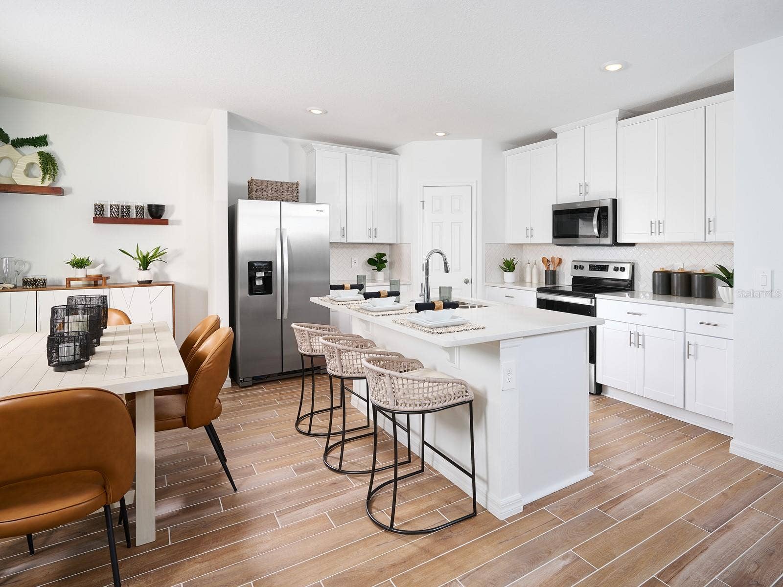 Welcome to Hamilton Bluff, a thoughtfully designed home that offers the perfect blend of space, comfort, and style. This versatile floor plan features four spacious bedrooms, three full baths, and an inviting living area ideal for gathering with family and friends. At the heart of the home, the beautiful kitchen provides the perfect setting for everything from casual meals to special occasions. Designed with modern living in mind, this exceptional home delivers a warm and welcoming atmosphere, making it the perfect place to create lasting memories and enjoy everyday moments in comfort.