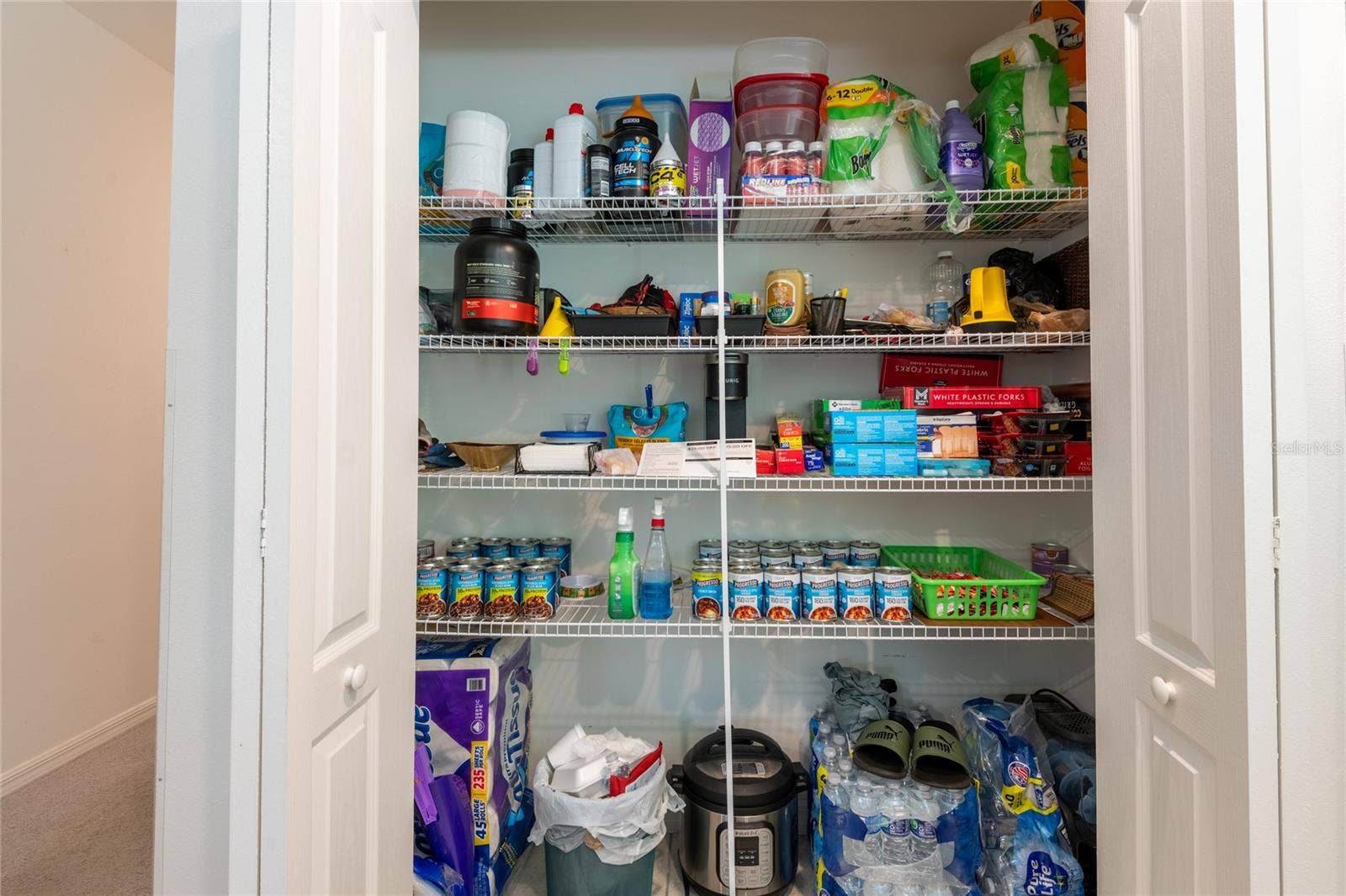 13459 BANYAN ROAD, Spring Hill, FL 34609 Large kitchen pantry.
