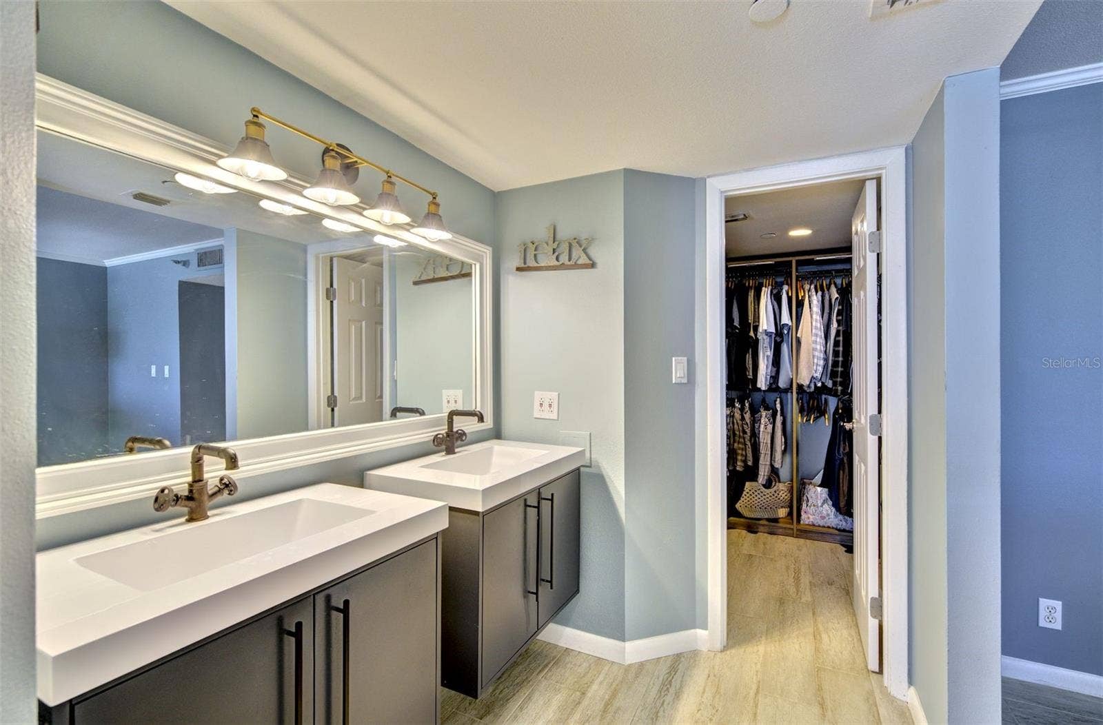 1340 GULF BOULEVARD, #10A, Clearwater, FL 33767 Primary bathroom dual vanities with walk in closet