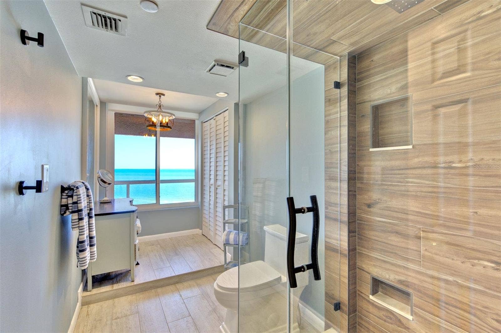 1340 GULF BOULEVARD, #10A, Clearwater, FL 33767 Primary ensuite bathroom with separate vanity space