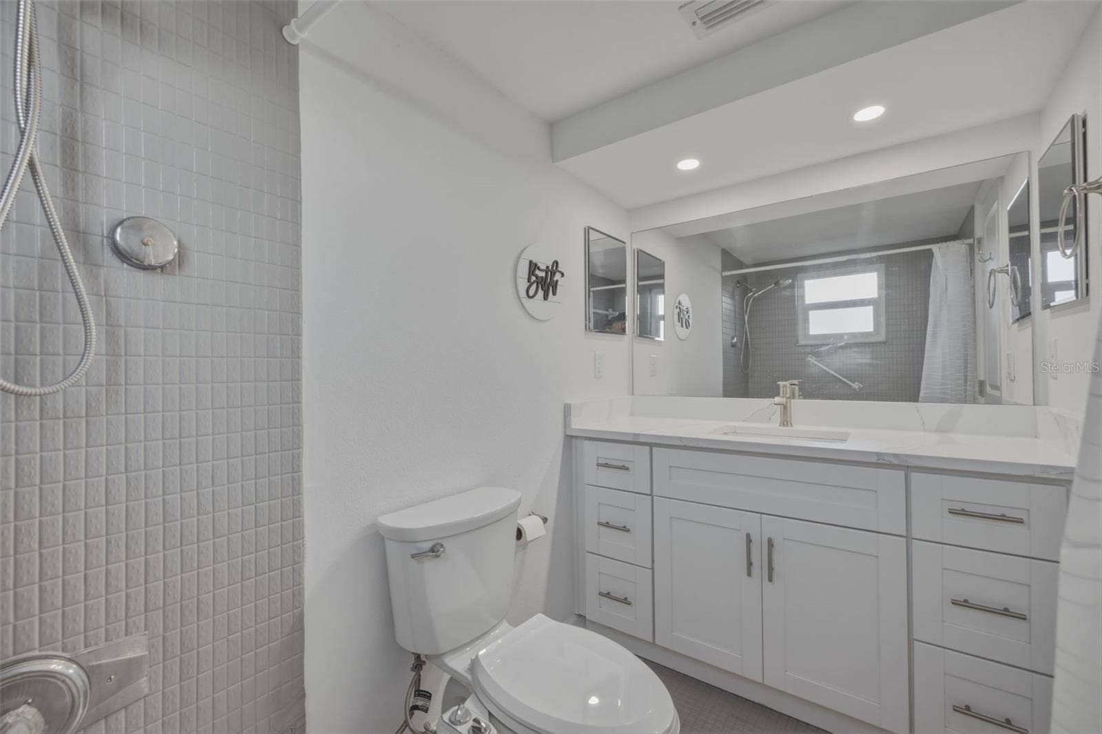 4700 COVE CIRCLE, #111, St Petersburg, FL 33708 Updated primary bathroom