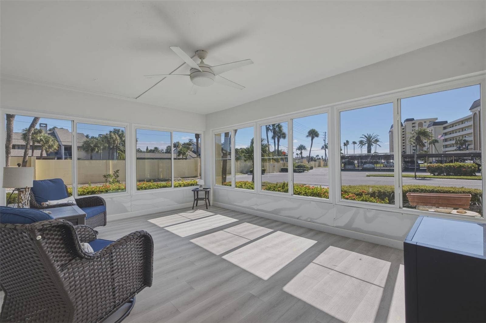 4700 COVE CIRCLE, #111, St Petersburg, FL 33708 Spacious sunroom bringing the outside in!