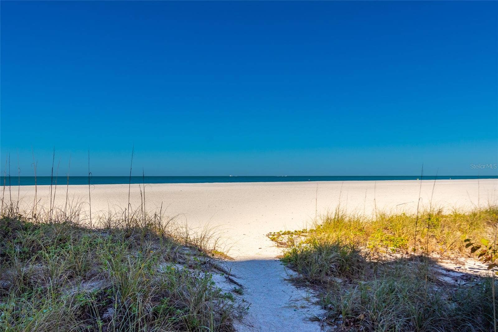 1380 GULF BOULEVARD, #307, Clearwater Beach, FL 33767 on to the Sands of Sand Key