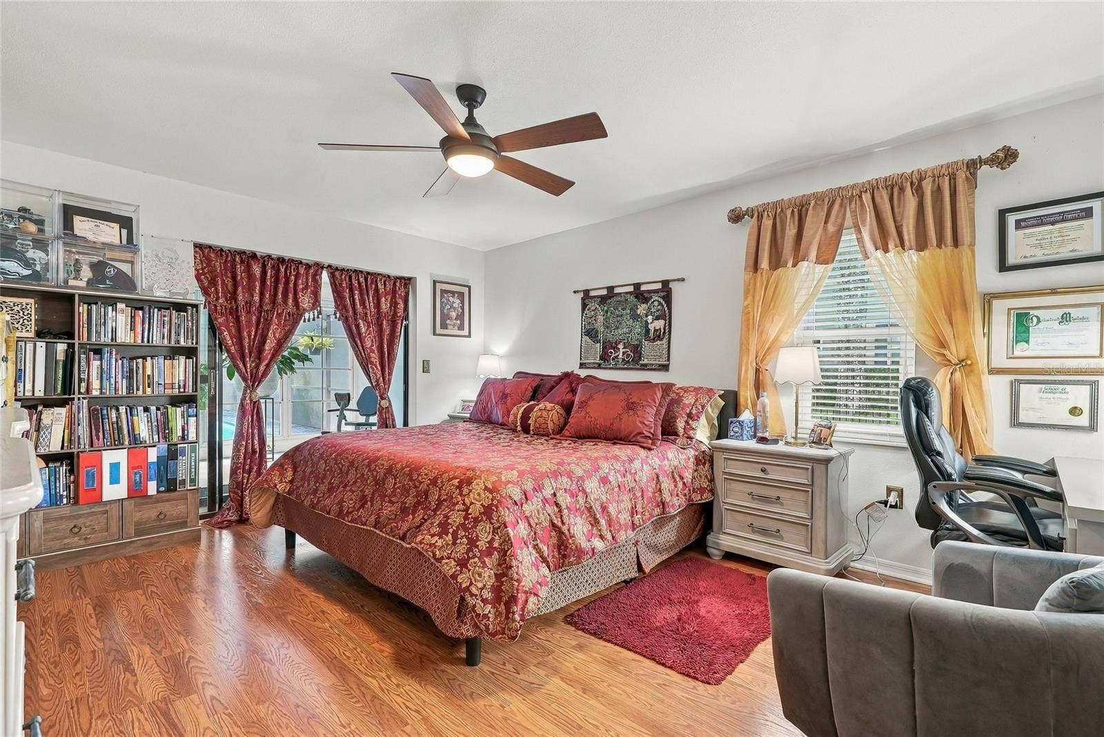 9896 DOMINGO DRIVE, Brooksville, FL 34601 Master Bedroom - with pocket doors leading to Florida Room