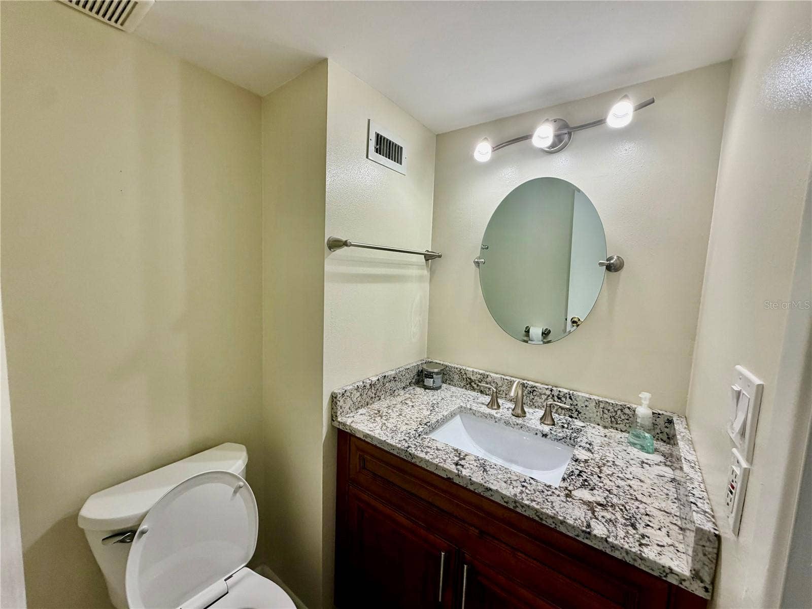 4517 W LA VILLA LANE, Tampa, FL 33611 This is the downstairs bathroom, the half bath