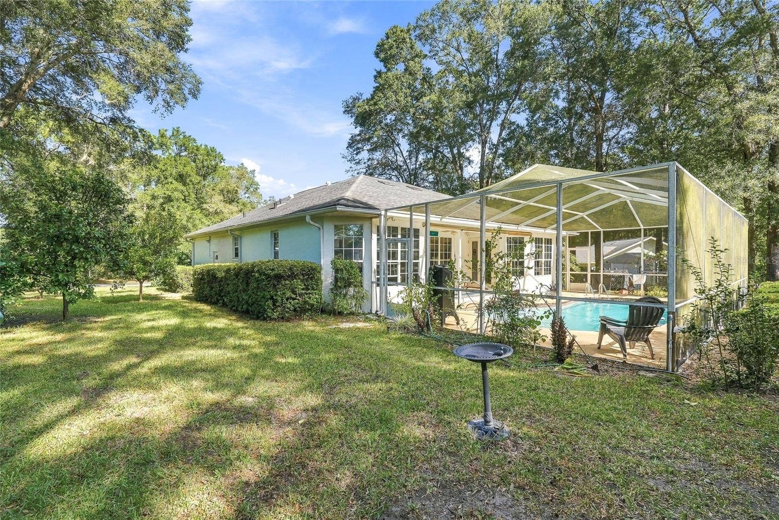 19480 SW 94TH STREET, Dunnellon, FL 34432 Back Exterior, with fruit trees