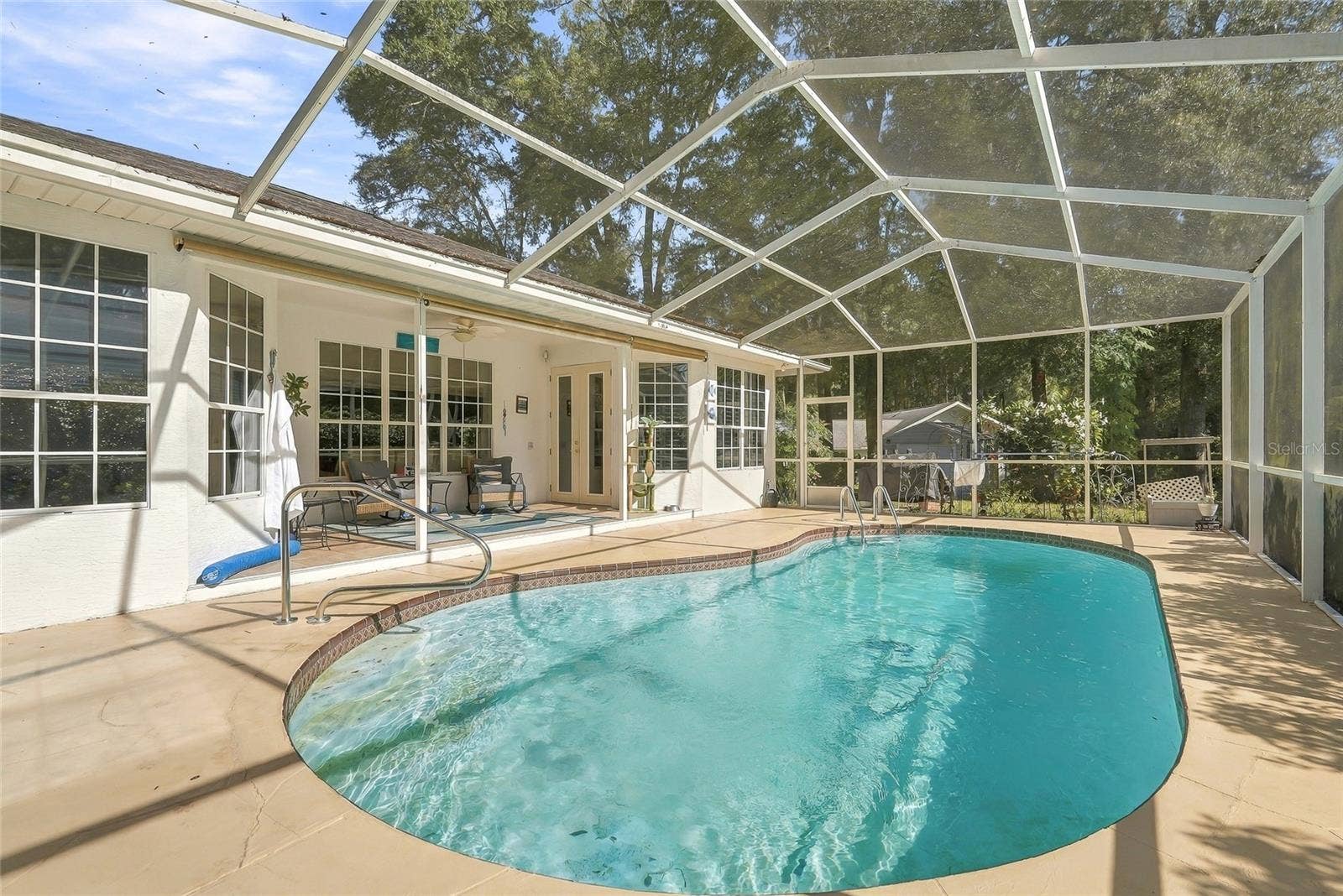 19480 SW 94TH STREET, Dunnellon, FL 34432 Screened in lanai with In-ground Heated POOL