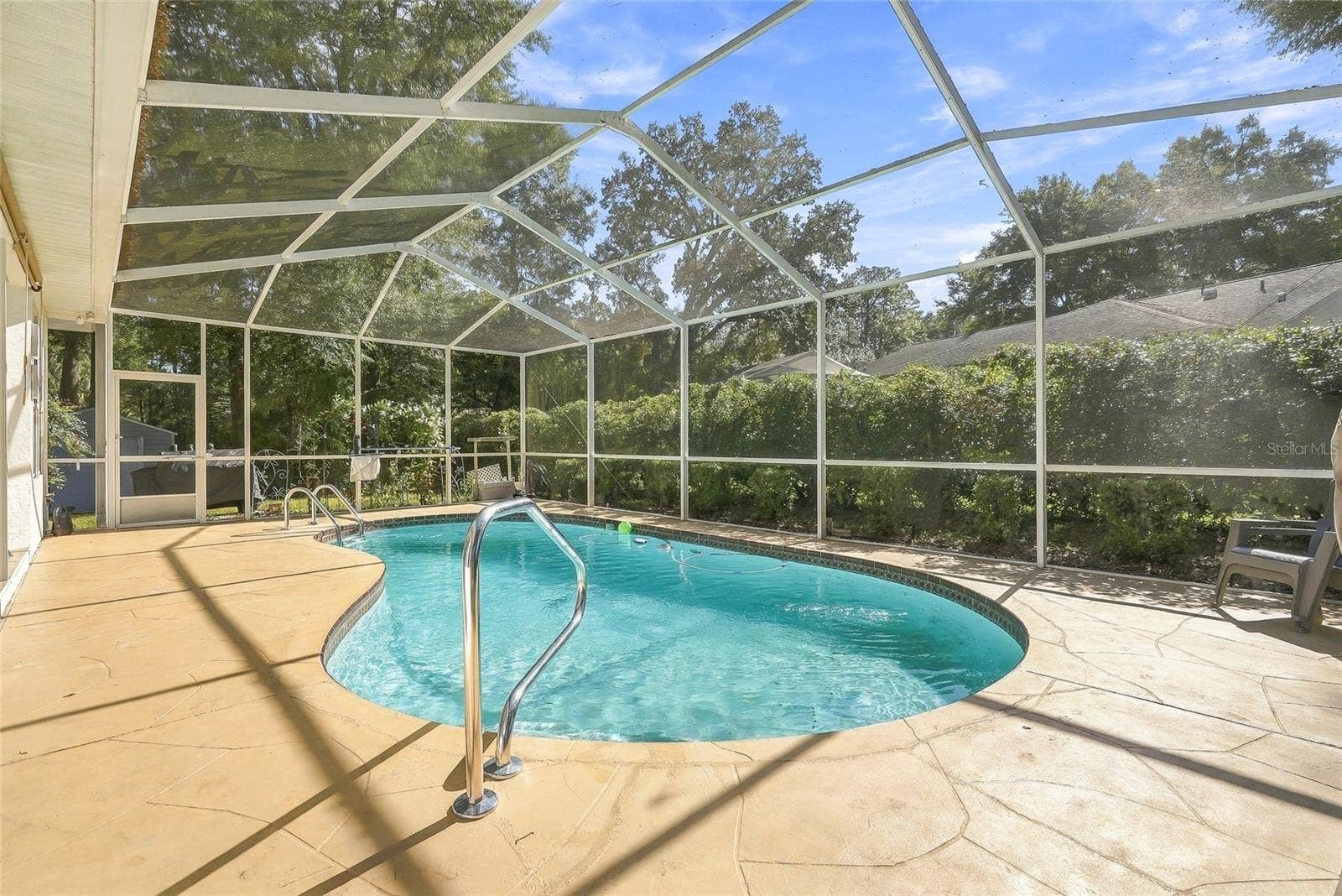 19480 SW 94TH STREET, Dunnellon, FL 34432 Screened in lanai with In-ground Heated POOL