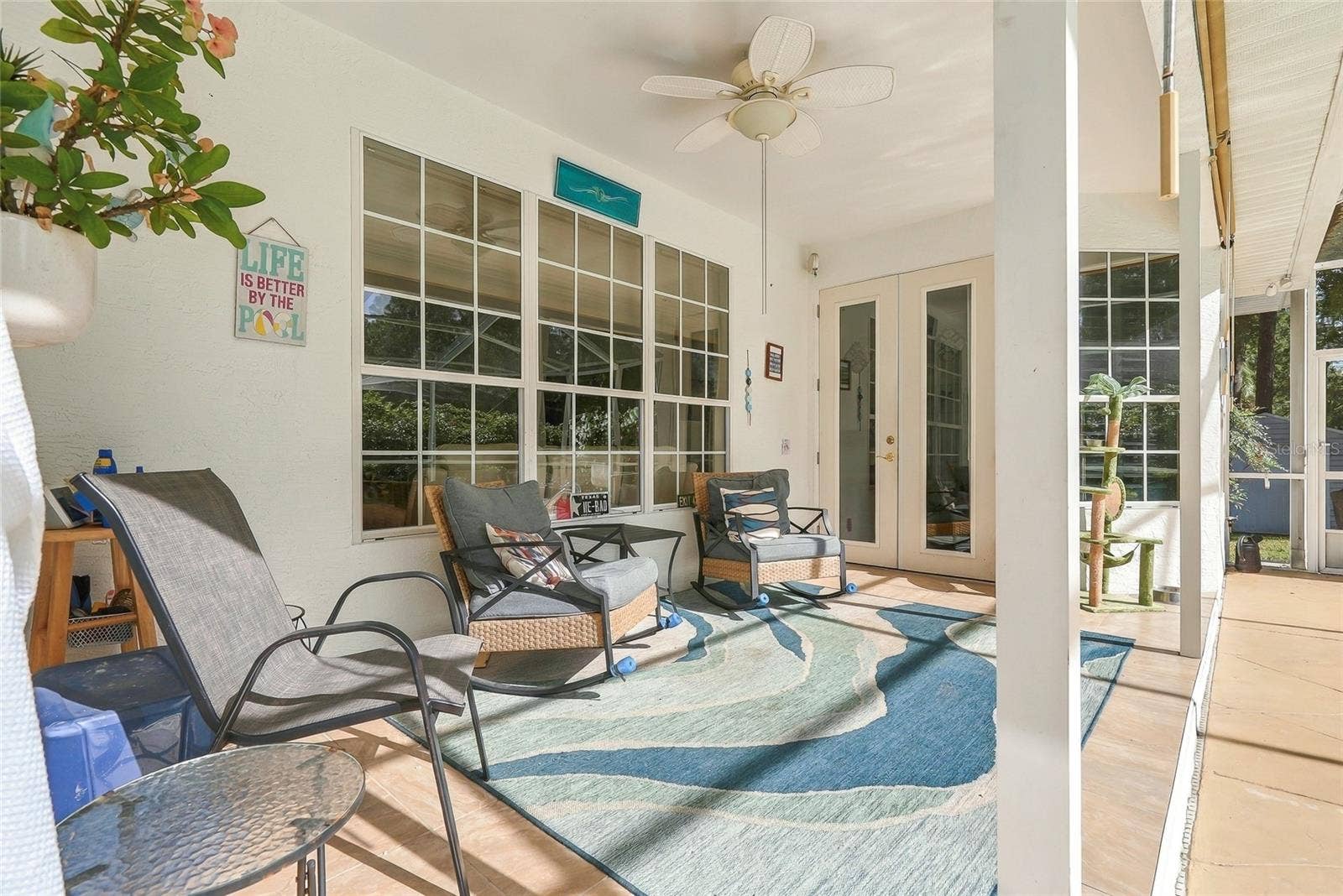 19480 SW 94TH STREET, Dunnellon, FL 34432 Covered Back Patio Seating Area