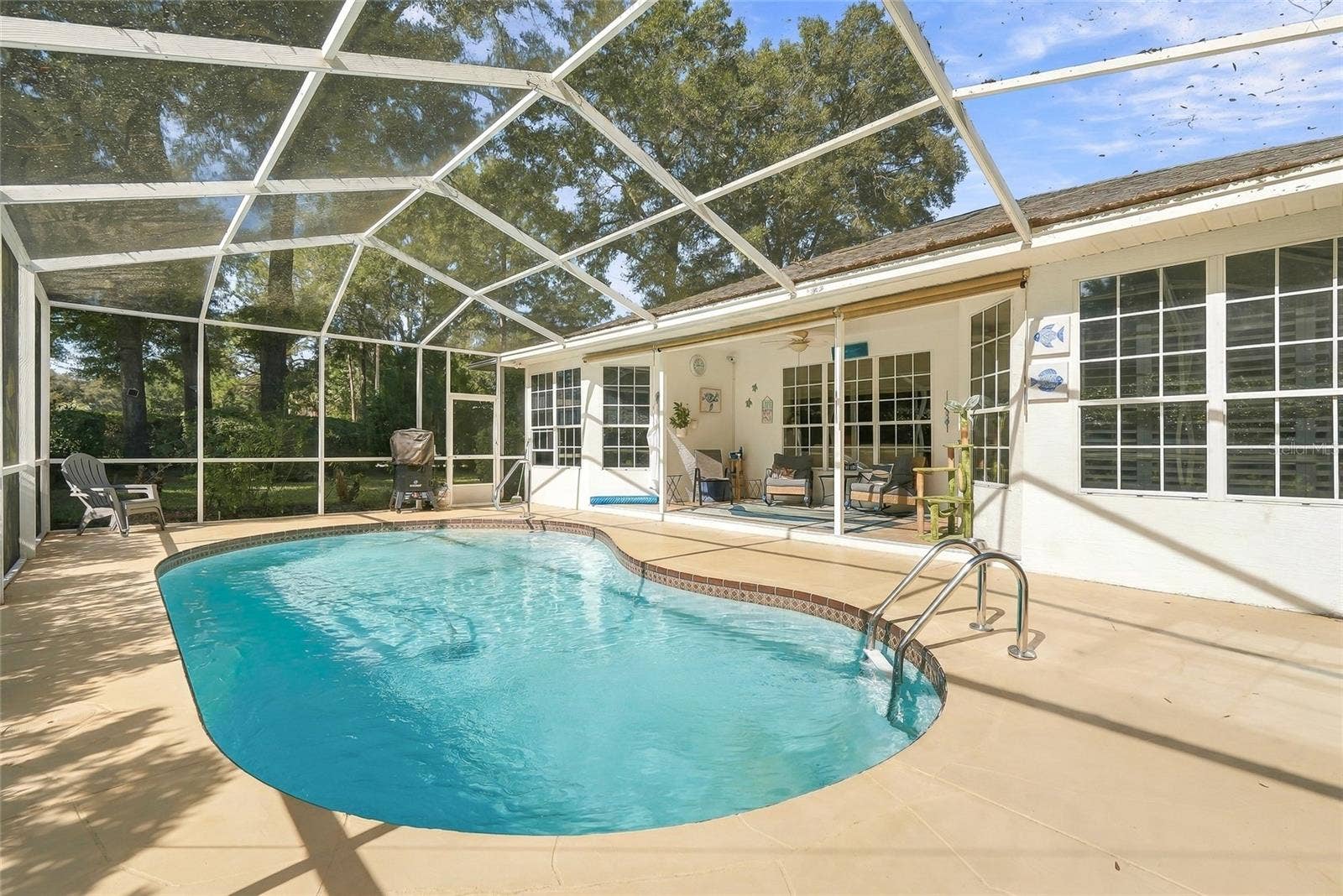 19480 SW 94TH STREET, Dunnellon, FL 34432 Screened in lanai with In-ground Heated POOL