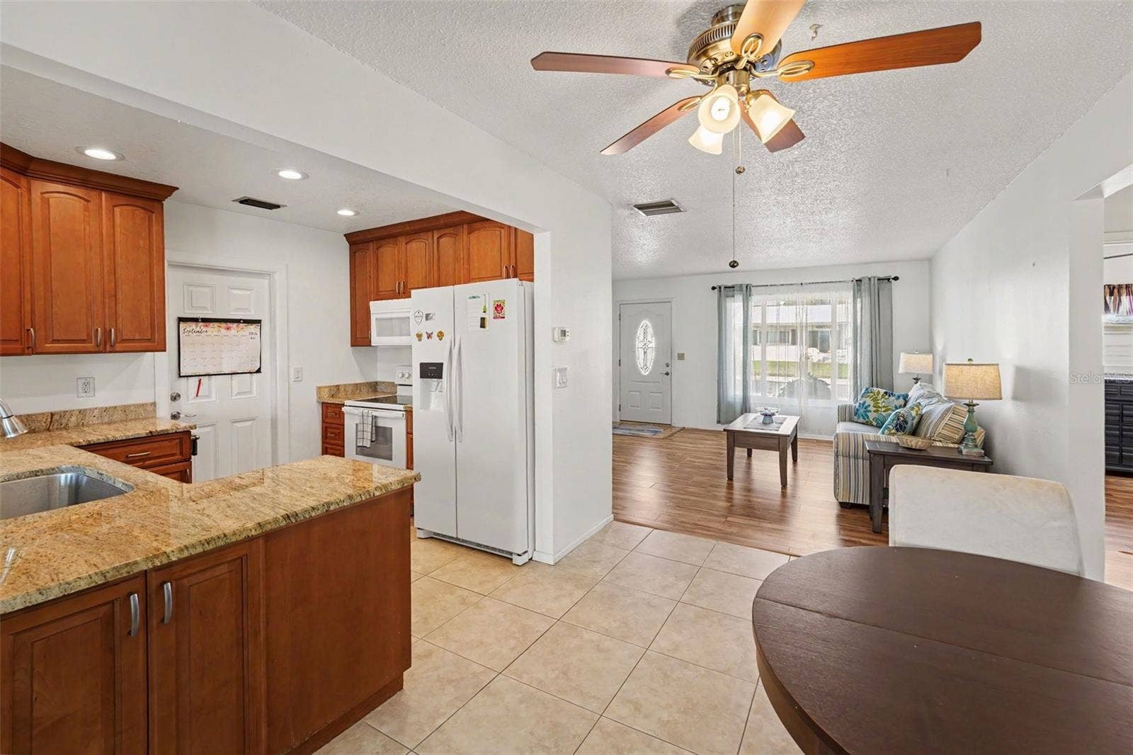 3474 101ST TERRACE N, Pinellas Park, FL 33782 Kitchen and Dining Area with Tile Flooring