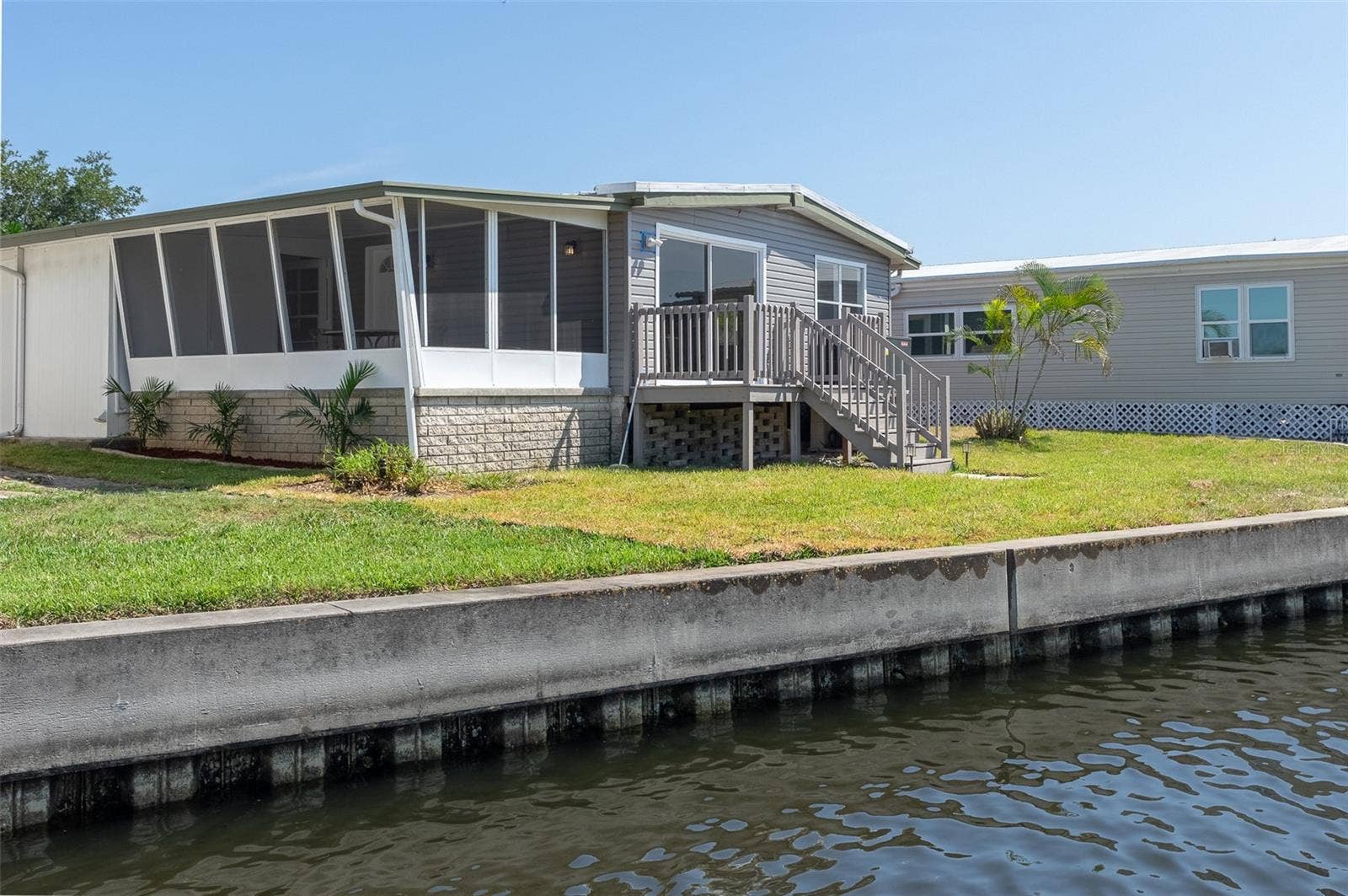 460 MOUNT OAK AVENUE NE, #745, St Petersburg, FL 33702 Rear view as seen from the seawall looking east 2