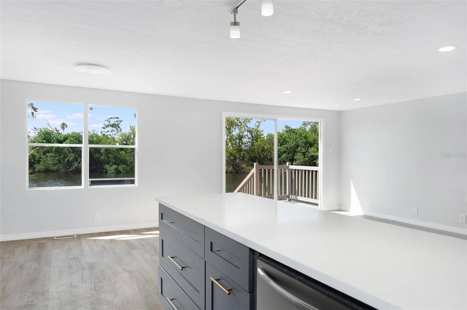 460 MOUNT OAK AVENUE NE, #745, St Petersburg, FL 33702 kitchen facing waterfront via diningroom and livingroom