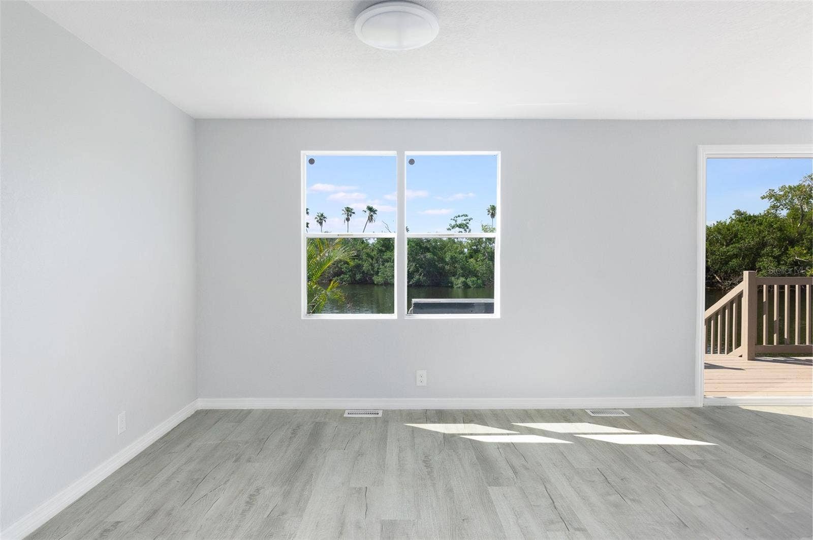 460 MOUNT OAK AVENUE NE, #745, St Petersburg, FL 33702 Dining Room facing waterfront