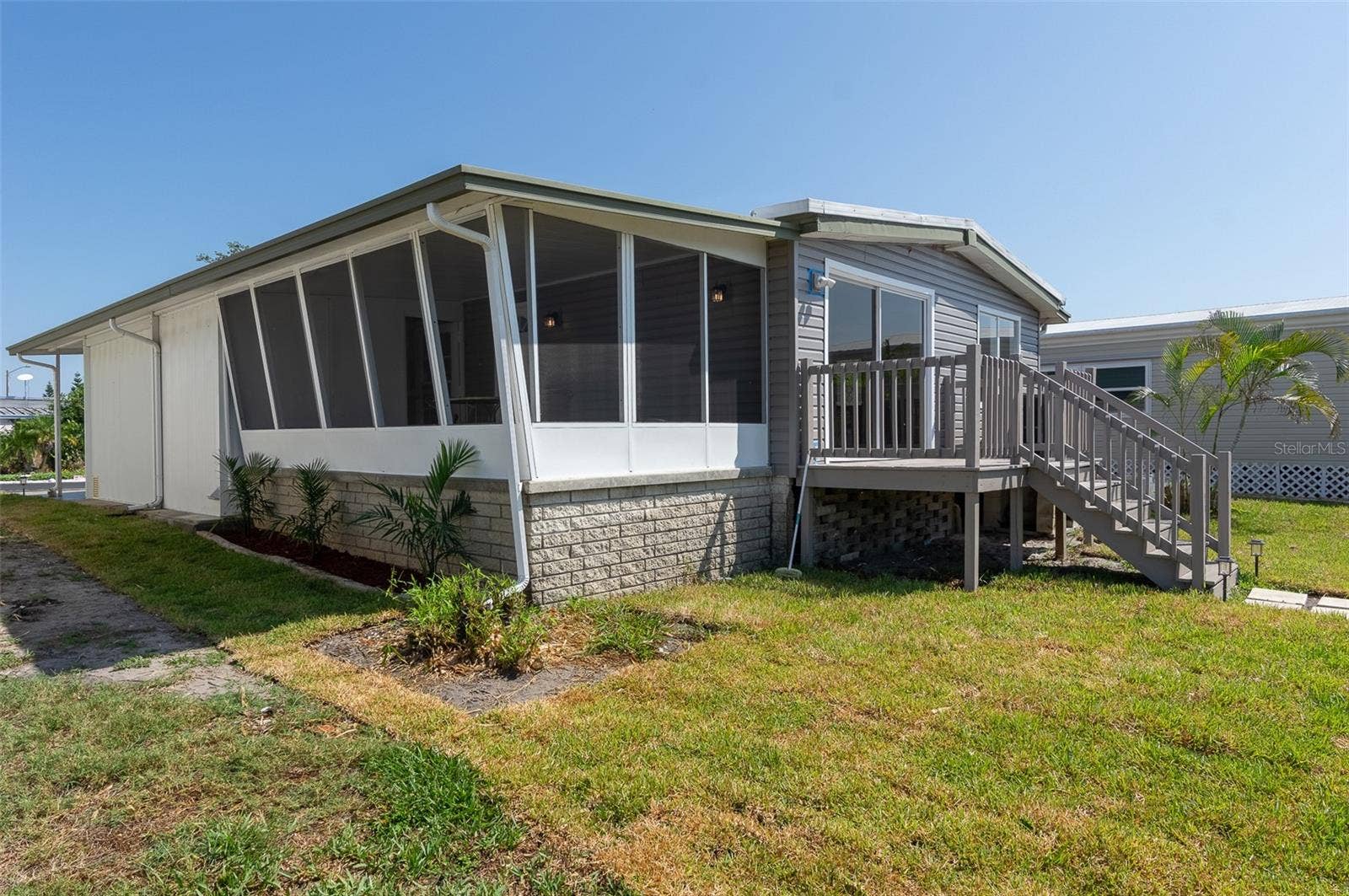 460 MOUNT OAK AVENUE NE, #745, St Petersburg, FL 33702 Rear view as seen from the seawall looking east