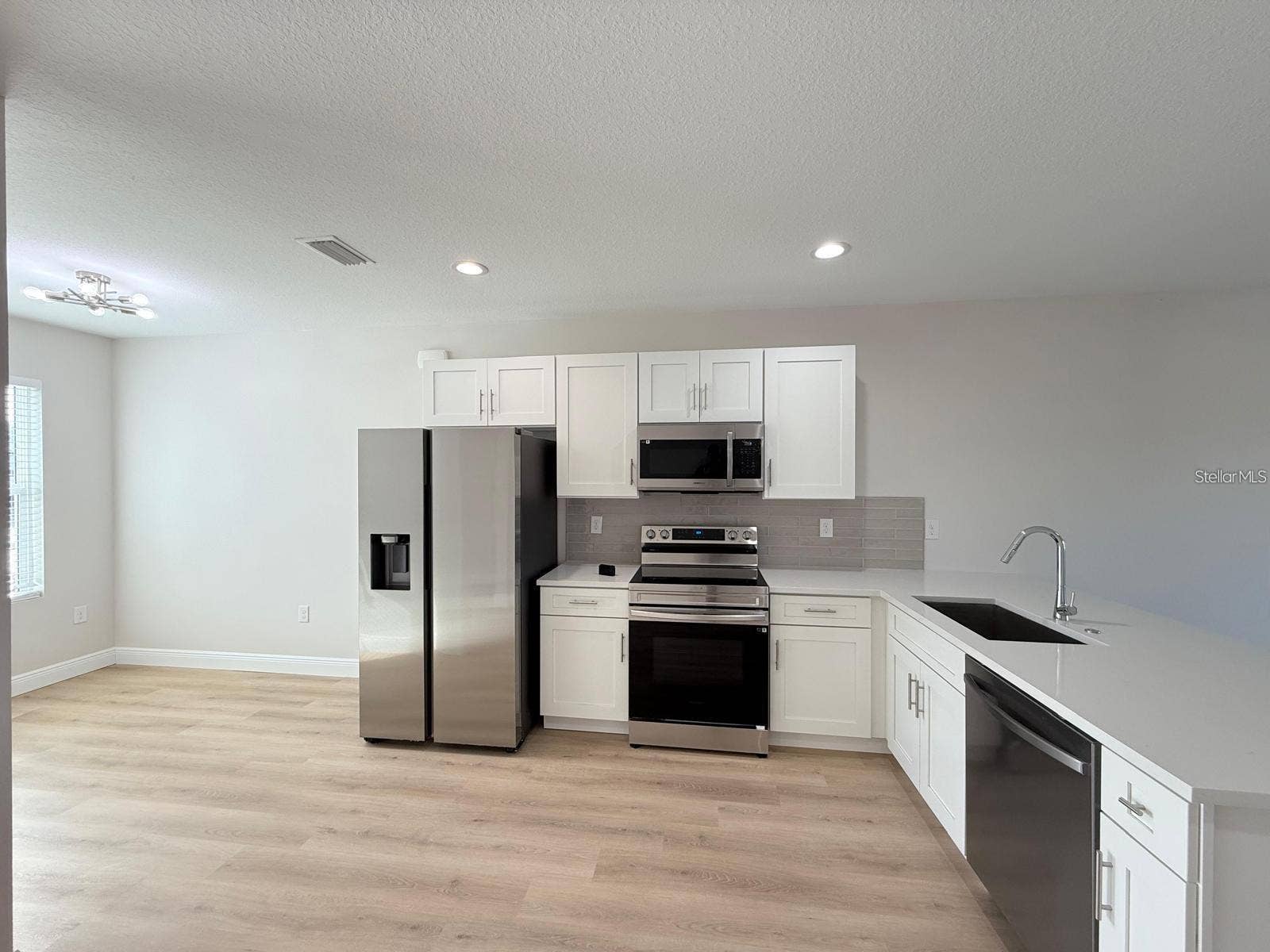 17099 CARLEEN AVENUE, Port Charlotte, FL 33948 This is the model home picture.