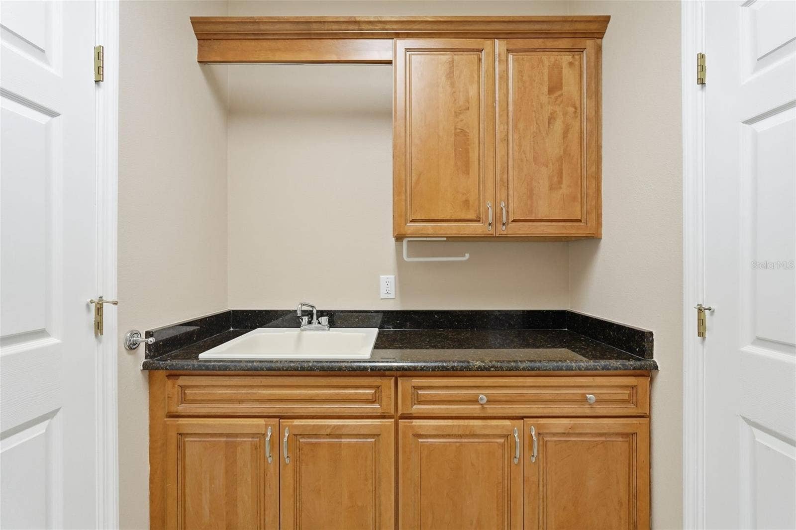 9718 TAYLOR ROSE LANE, Seminole, FL 33777 Sink in the laundry room