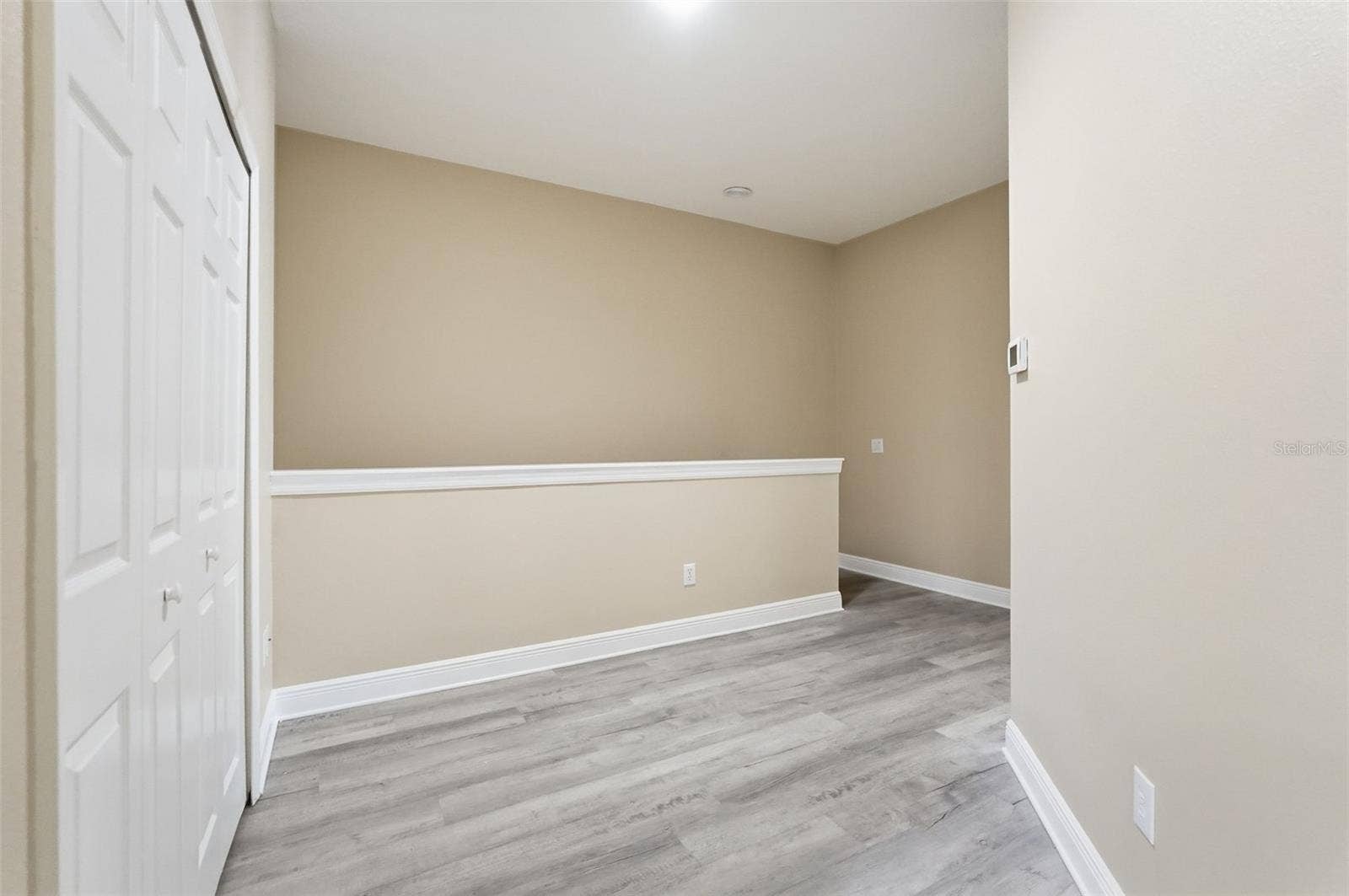 9718 TAYLOR ROSE LANE, Seminole, FL 33777 Landing area, room for a desk or play area