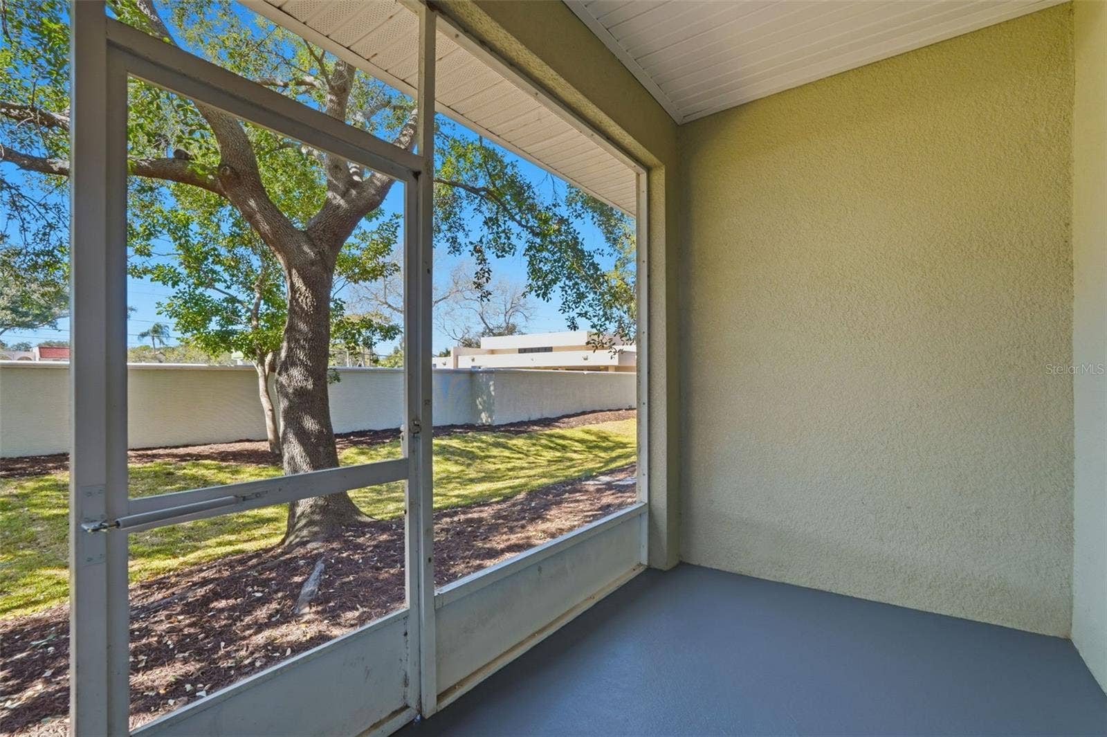 9718 TAYLOR ROSE LANE, Seminole, FL 33777 Porch on the first floor off of the living room